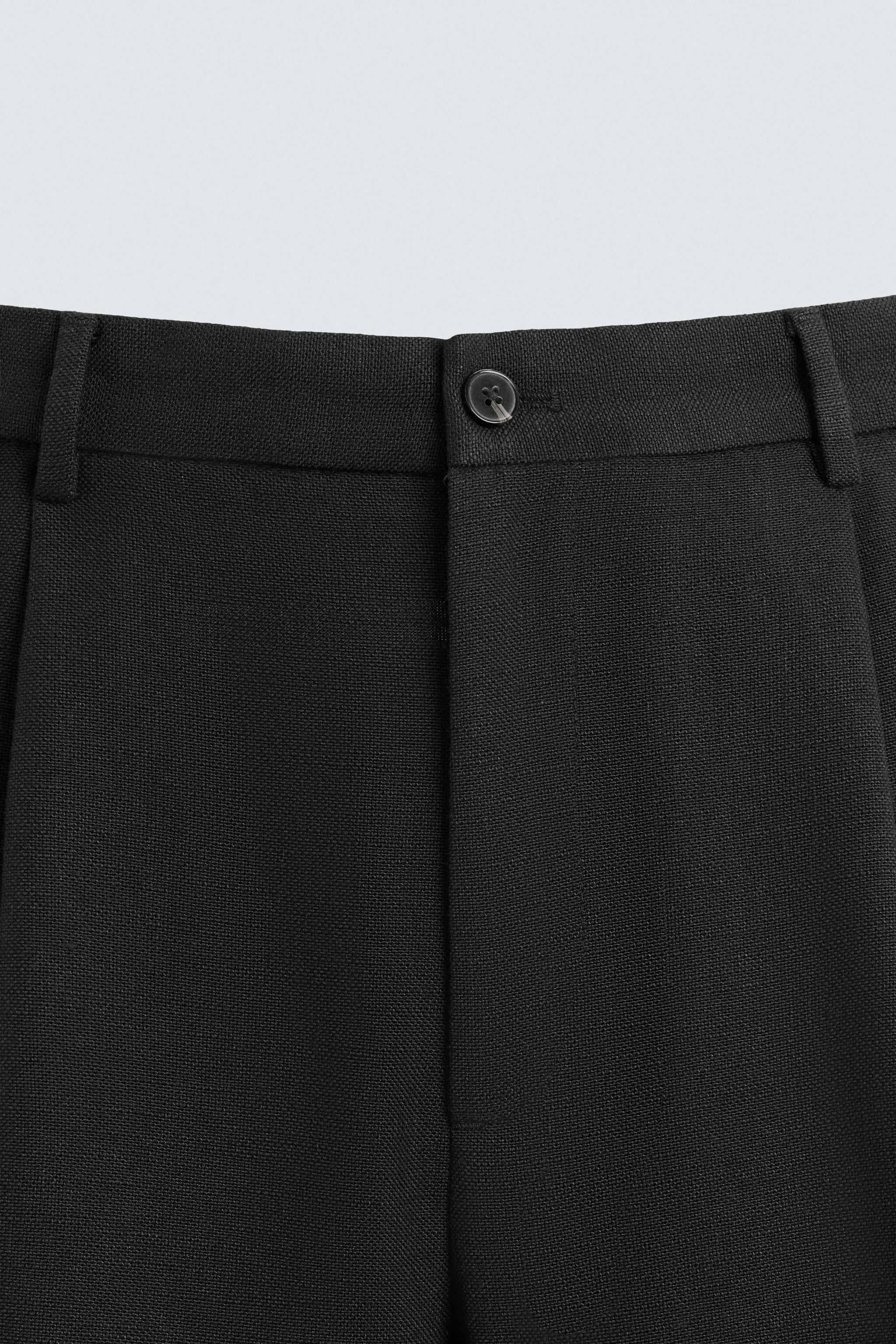 PLEATED RELAXED FIT PANTS