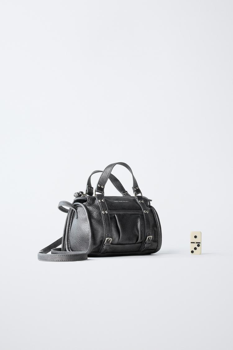 BOLSO CRUZADO CON TACHAS 6