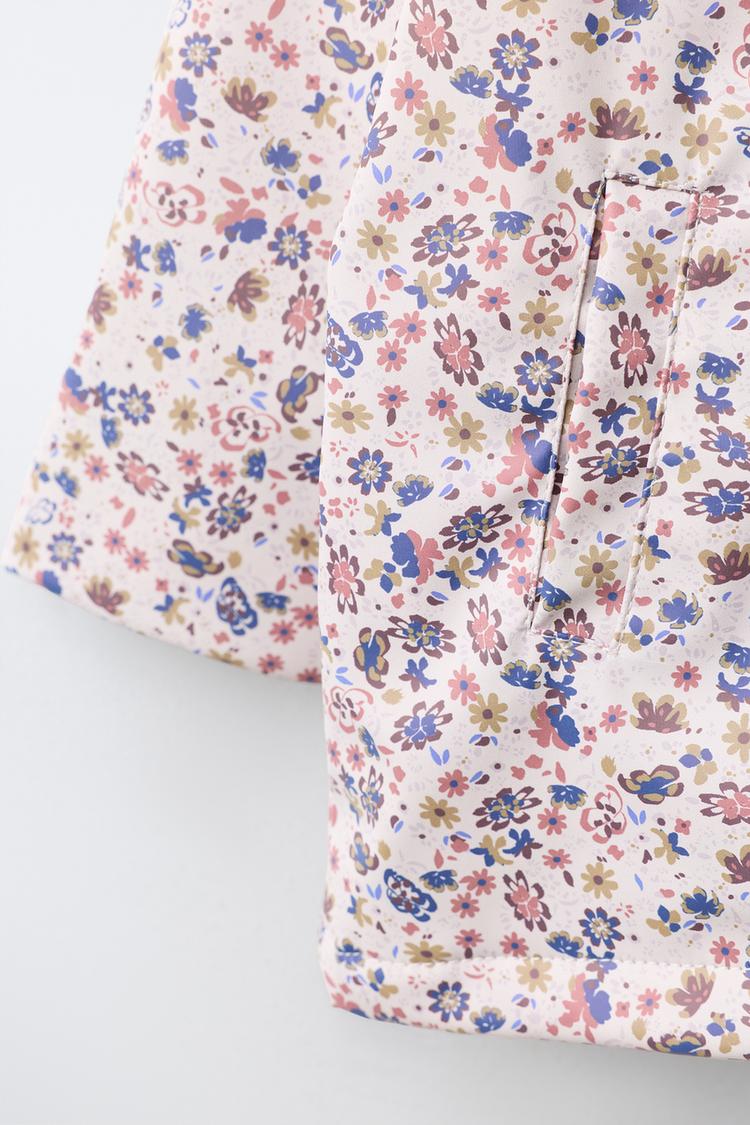 Impermeable floral de goma resistente al agua 5