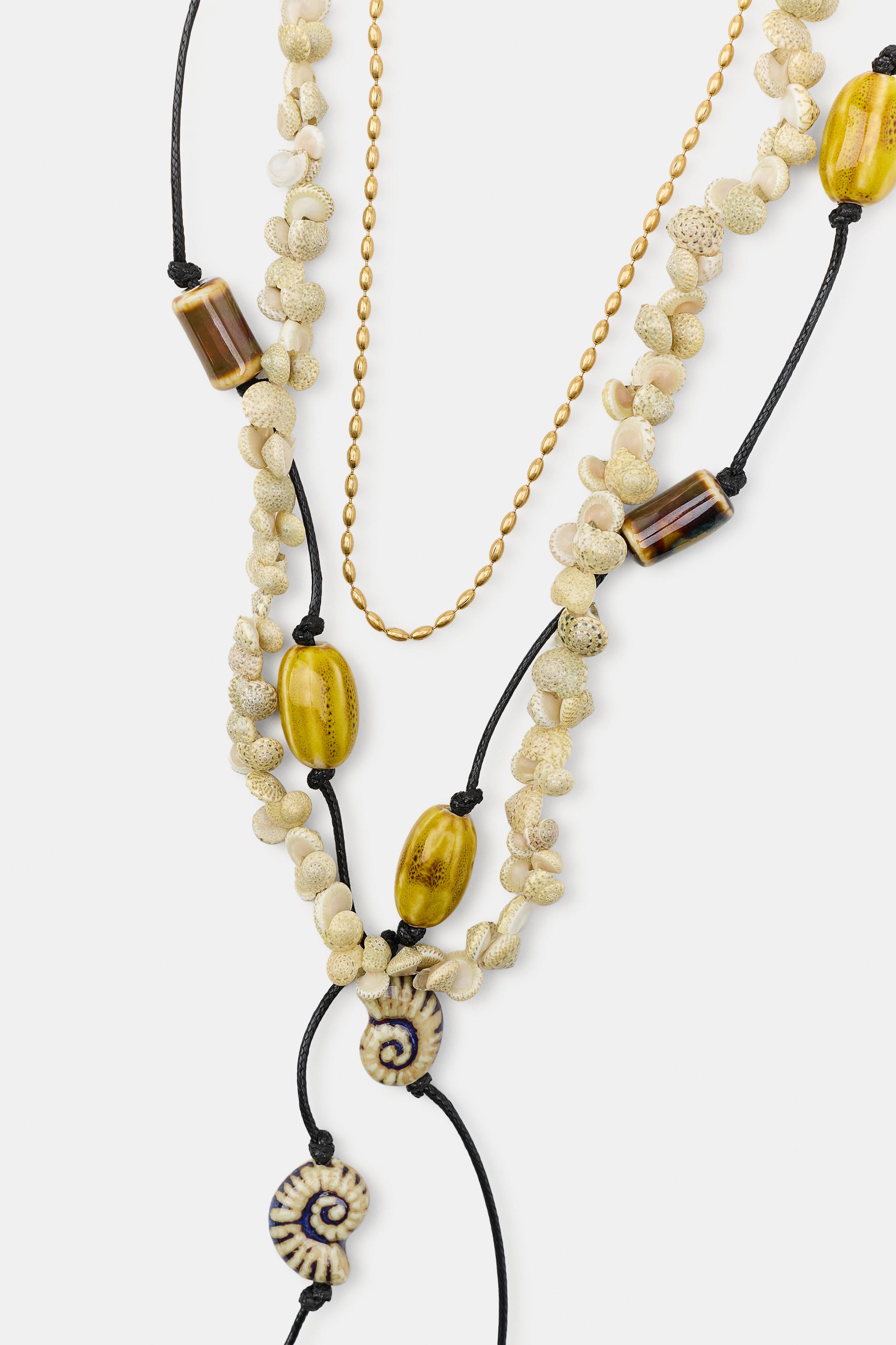 PACK OF 3 CORD NECKLACES WITH SHELLS AND CERAMIC