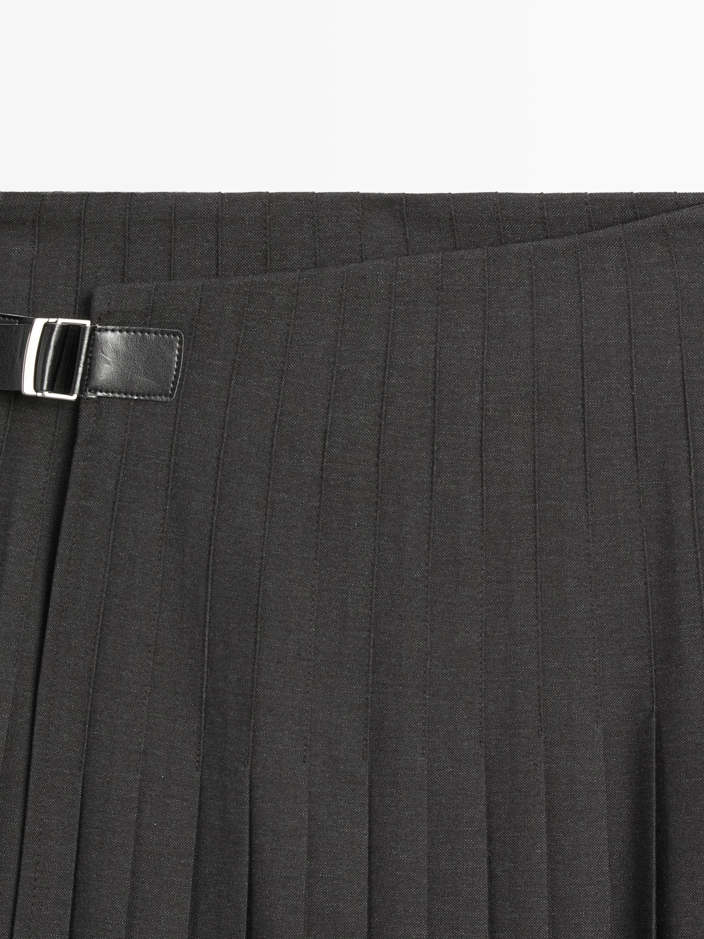 Jupe midi plissée applique