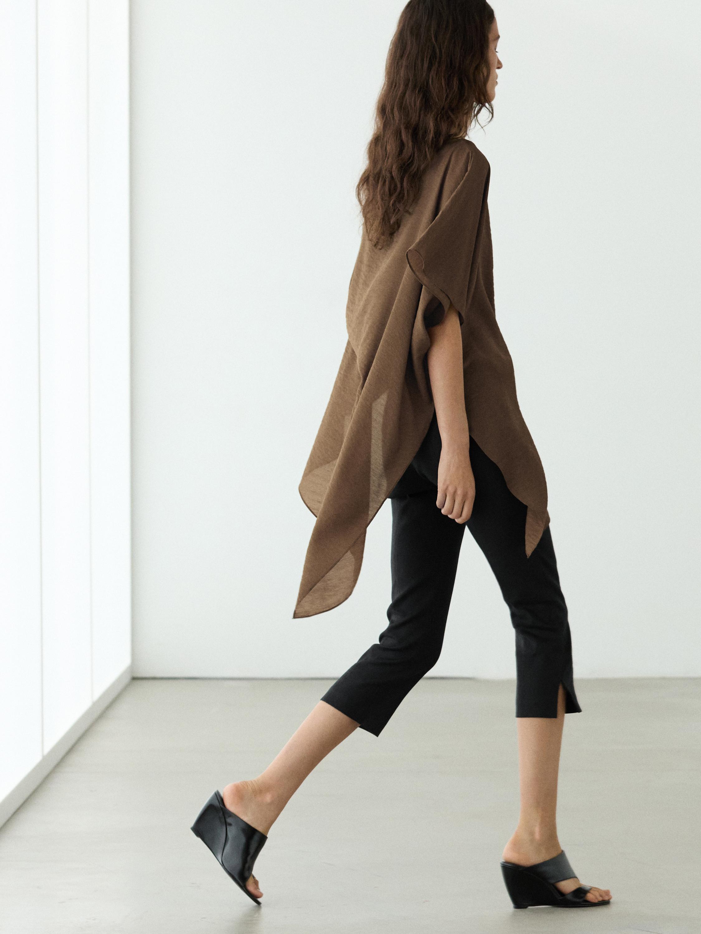Asymmetric cape-style flowing blouse