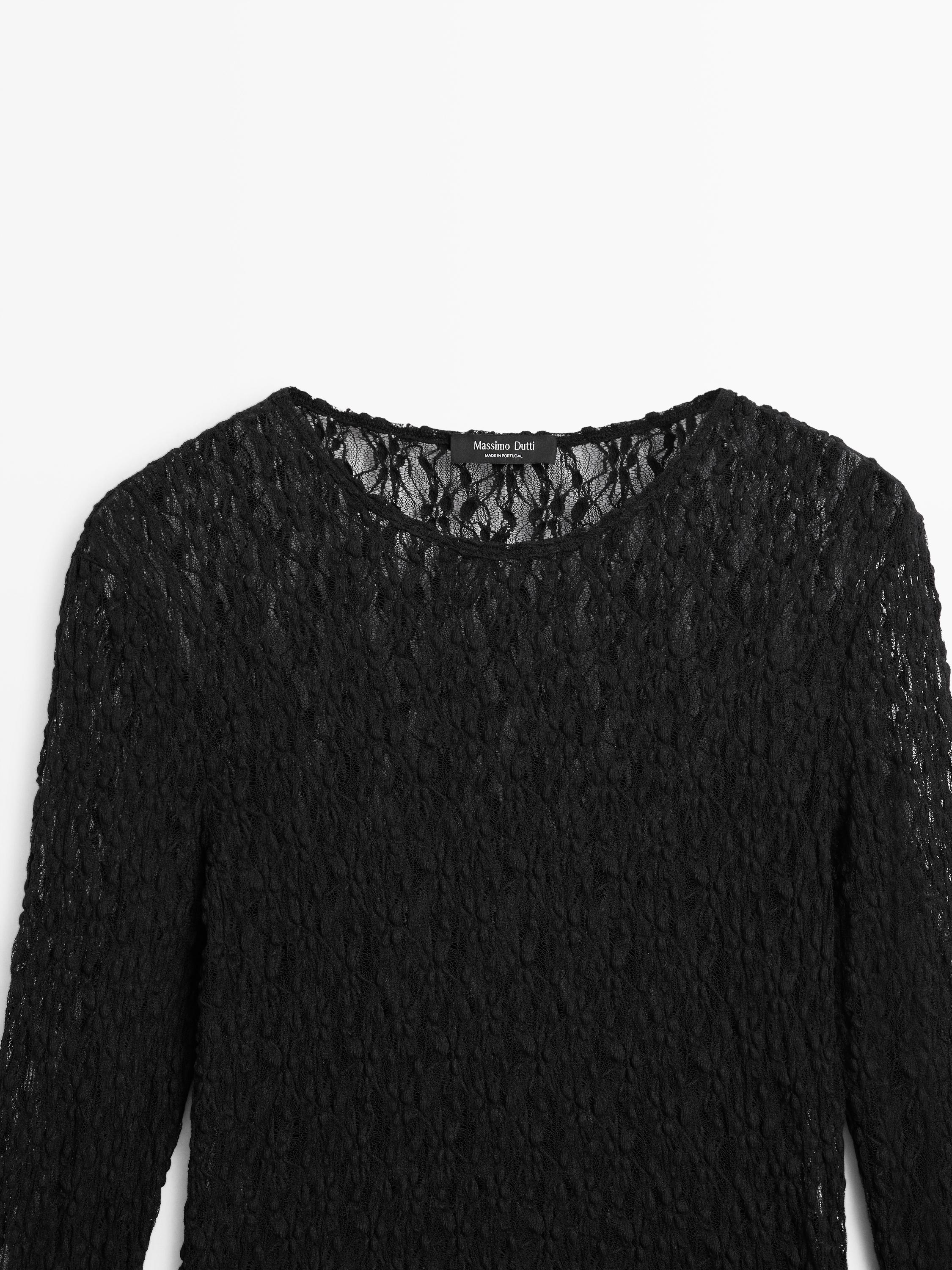 Openwork knit top with long sleeves and lace