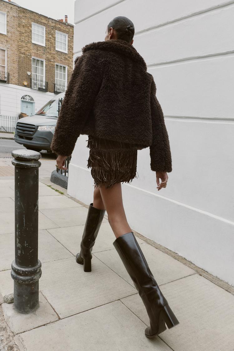 SHIMMERING FAUX SUEDE FRINGE SKIRT