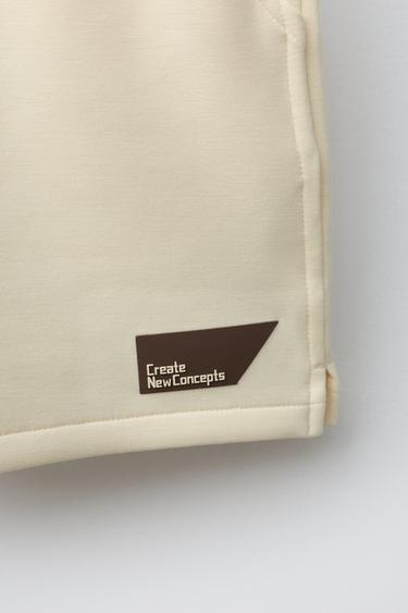 SHORT INTERLOCK ÉTIQUETTE - Jaune clair de Zara - Image 3