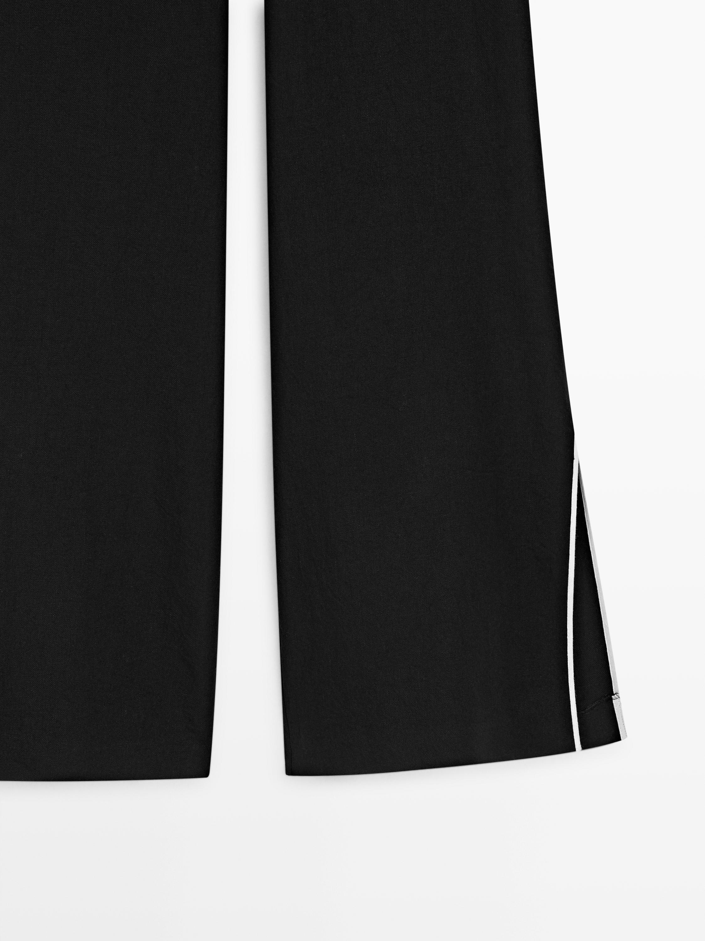 Linen trousers with contrast trim