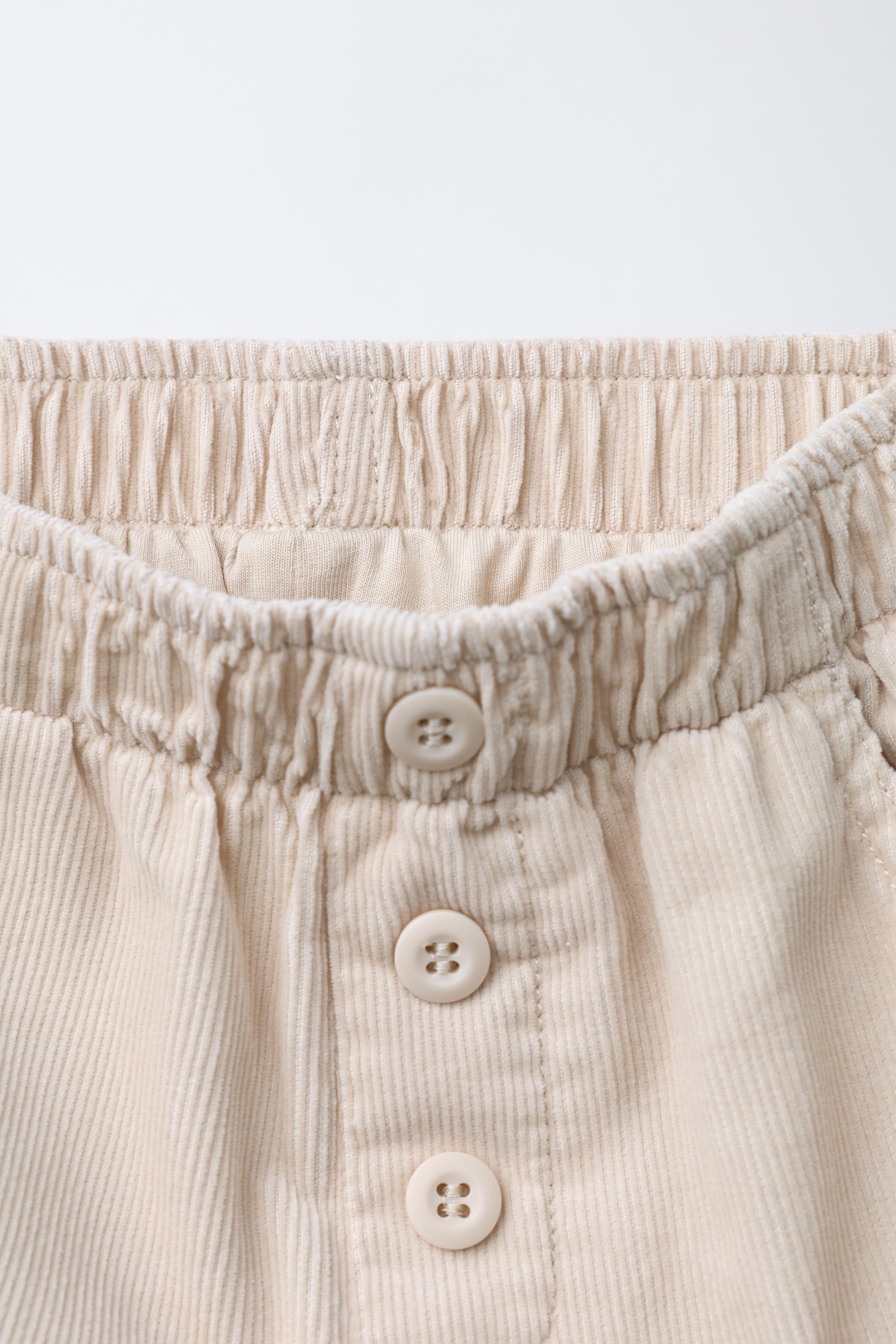 LINED CORDUROY PANTS WITH BUTTONS