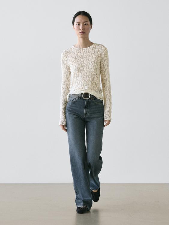 Openwork knit top with long sleeves and lace