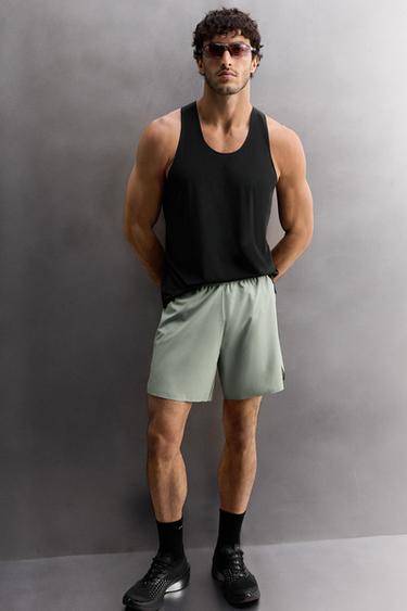 LIGHTWEIGHT PERFORATED SHORTS - Light blue by Zara