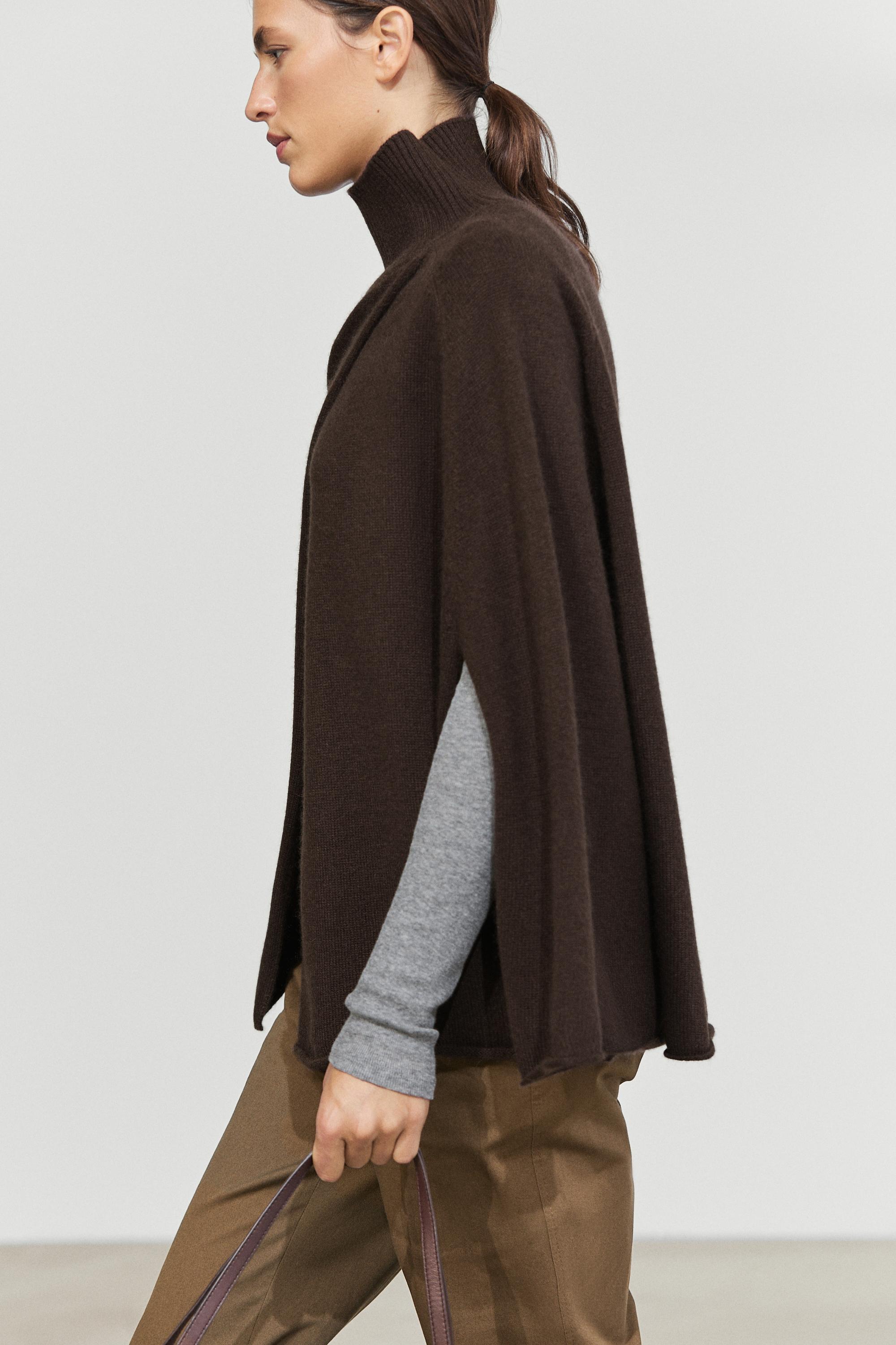 100% cashmere knit cape with crossover detail