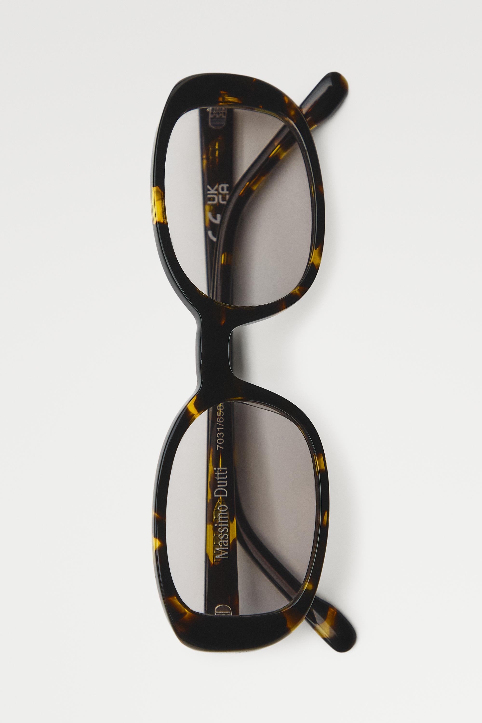 Oval tortoiseshell-effect sunglasses — 734
