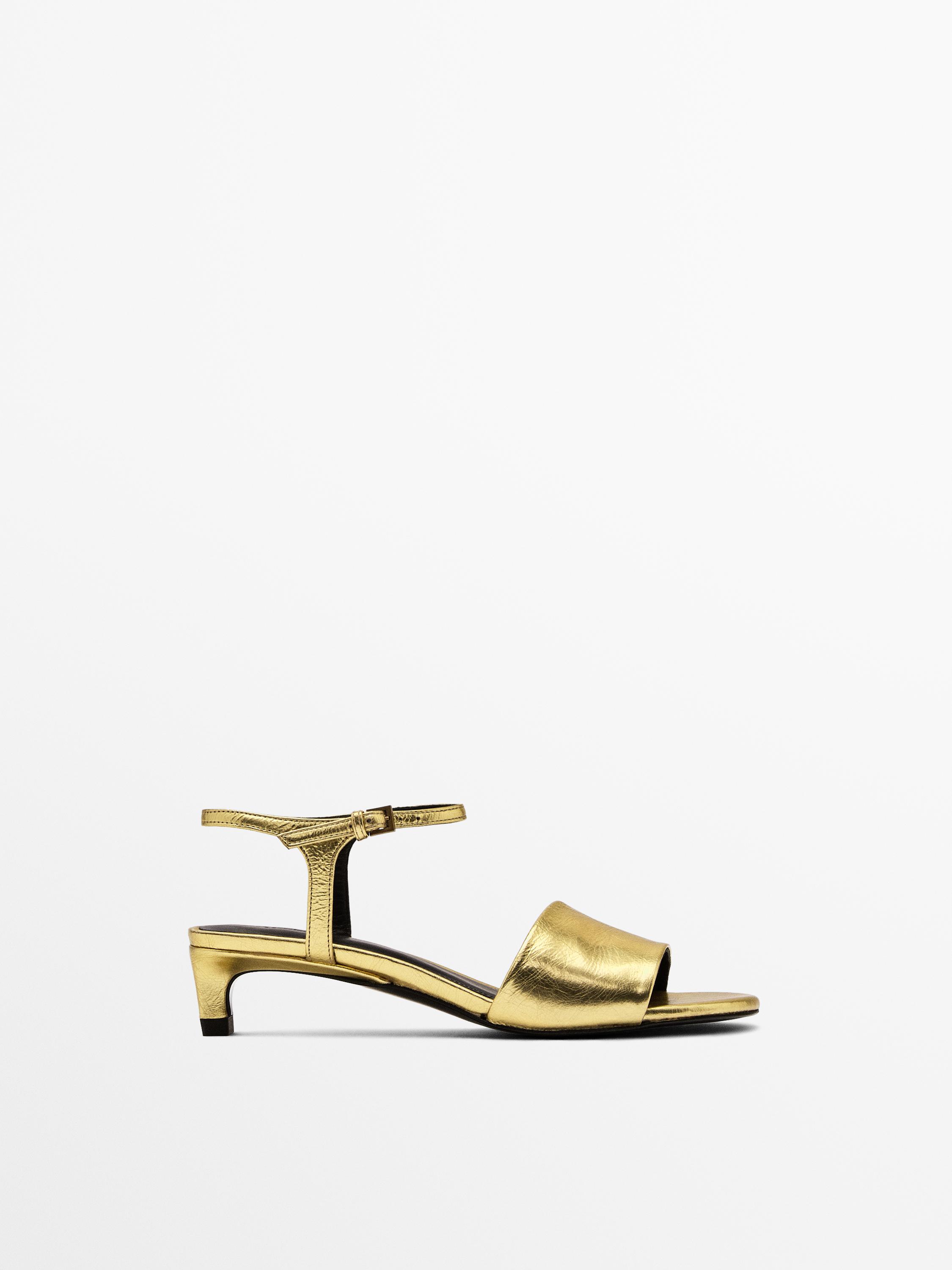 Golden slide sandals