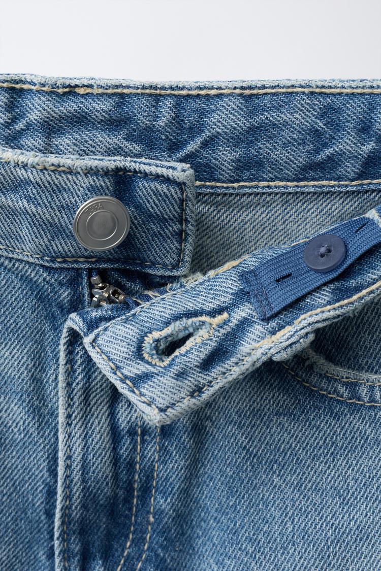 JEANS DE PIERNA ANCHA DESLAVADOS 3