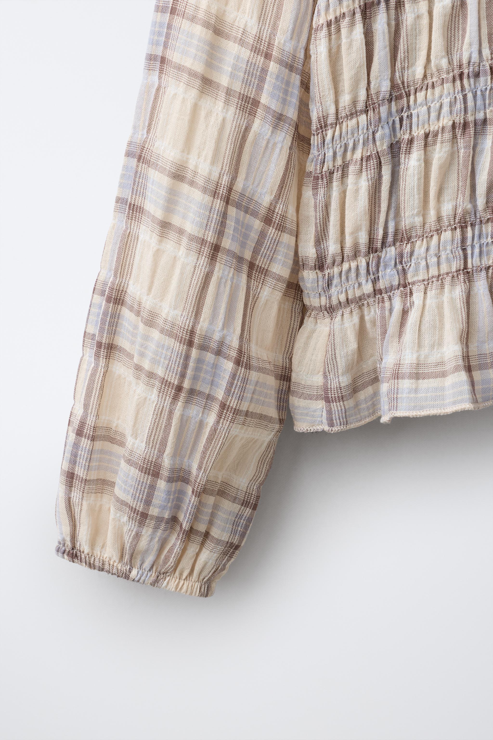 CHEMISE À CARREAUX ET ÉLASTIQUES