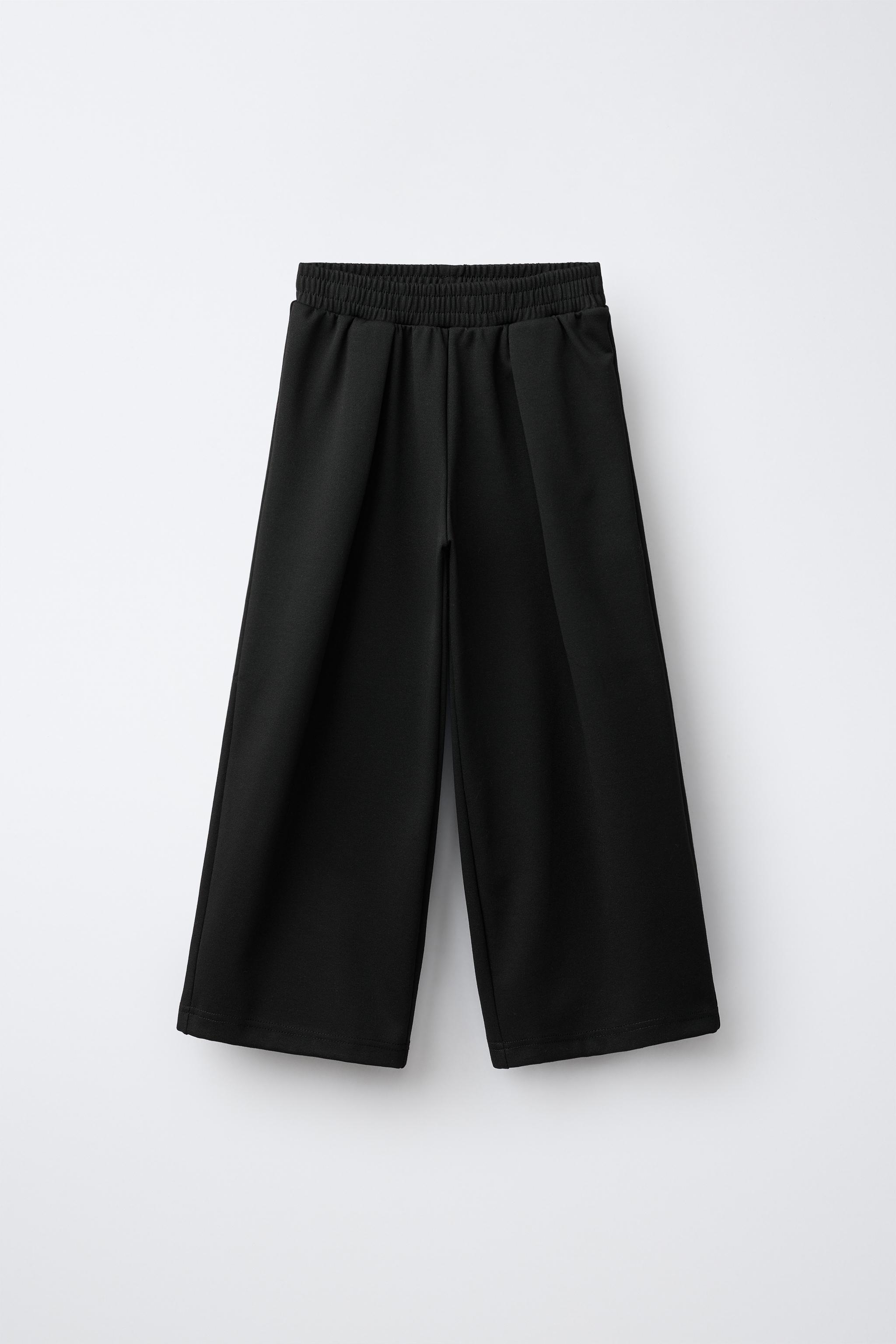 INTERLOCK PLEATED WIDE-LEG PANTS