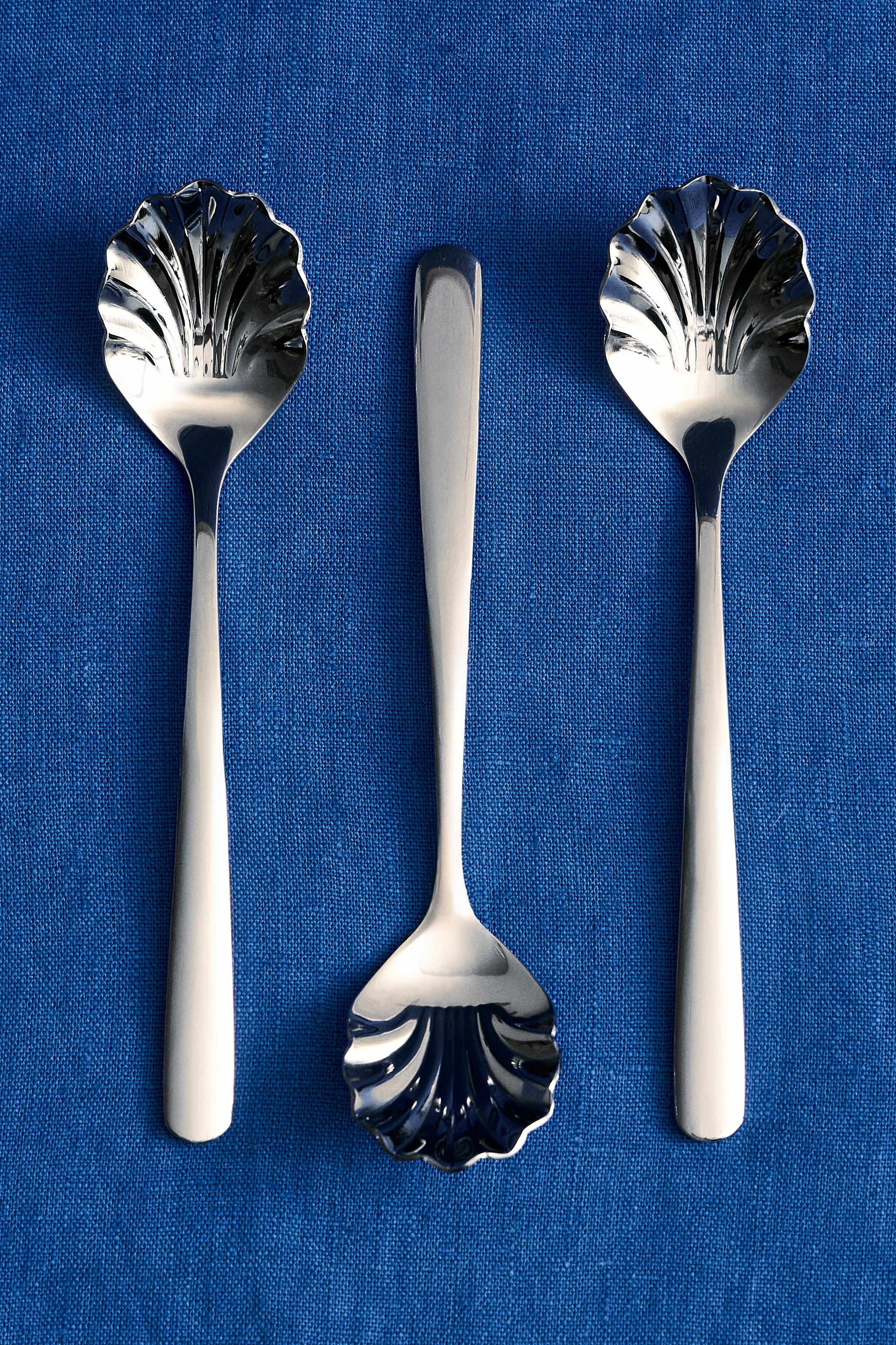 PACK OF STEEL SHELL DESSERT SPOONS (PACK OF 4) — Steel
