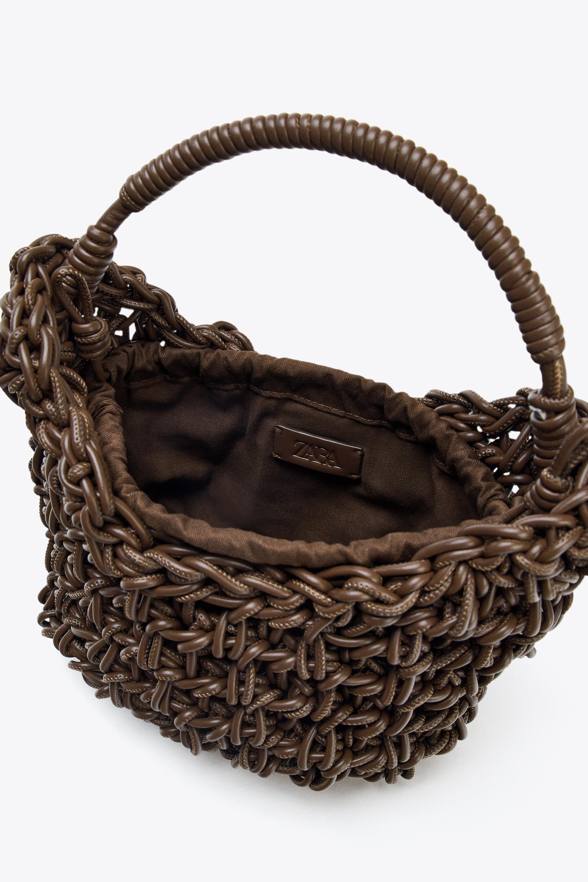 SAC À MAIN TRESSÉ SURPIQÛRES
