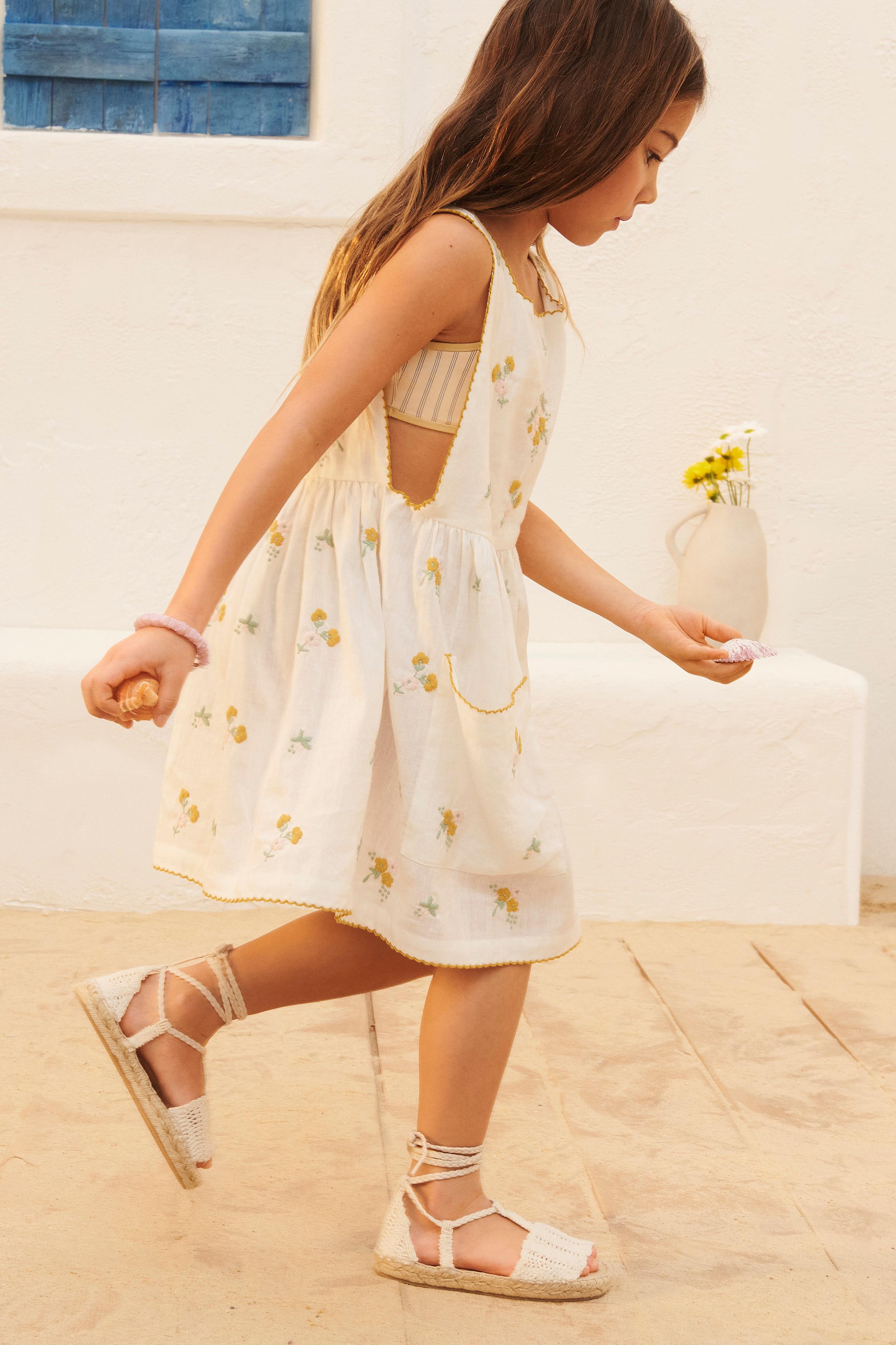 LIMITED EDITION LINEN PINAFORE DRESS WITH EMBROIDERED