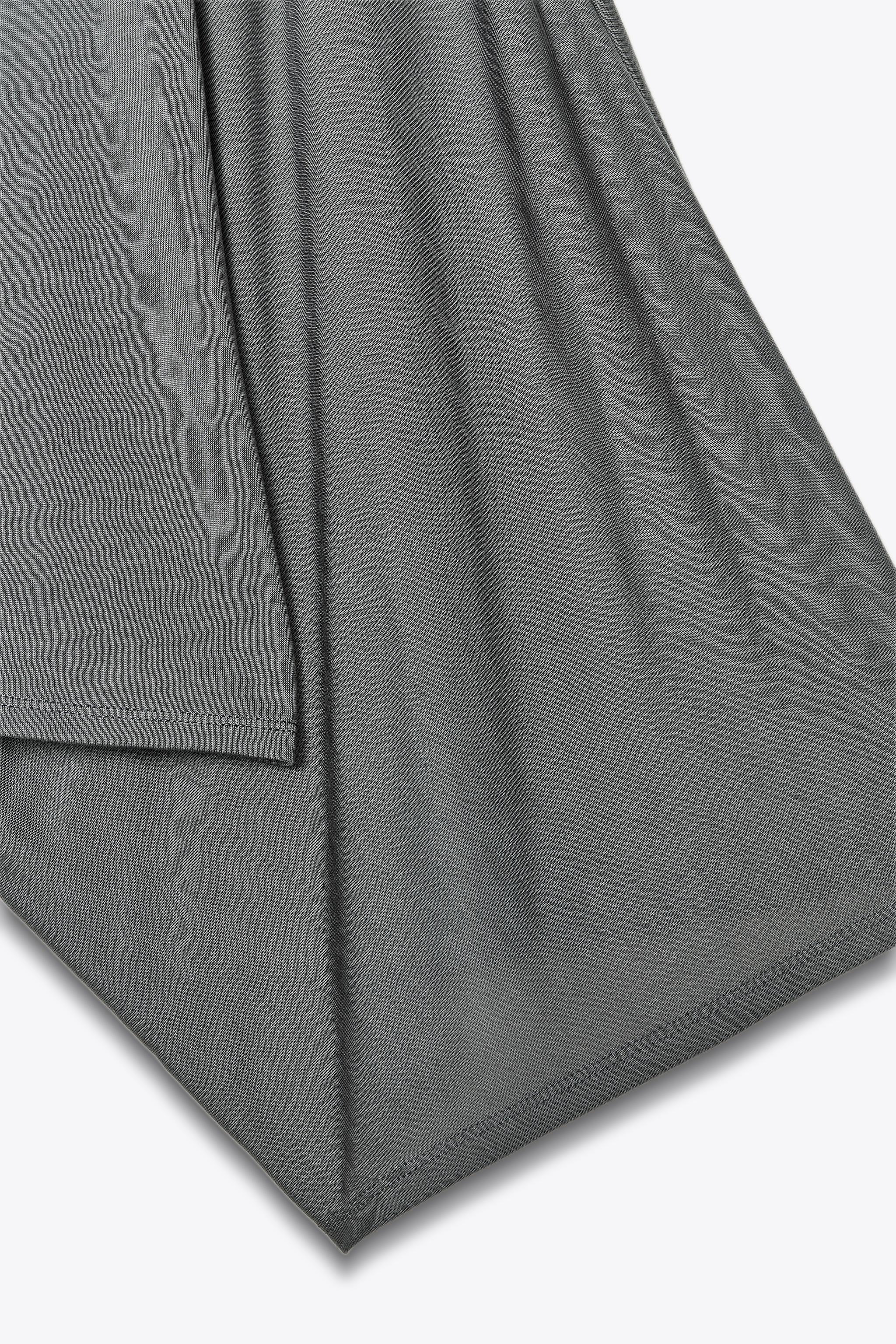 ASYMMETRIC FLOWY CAPE