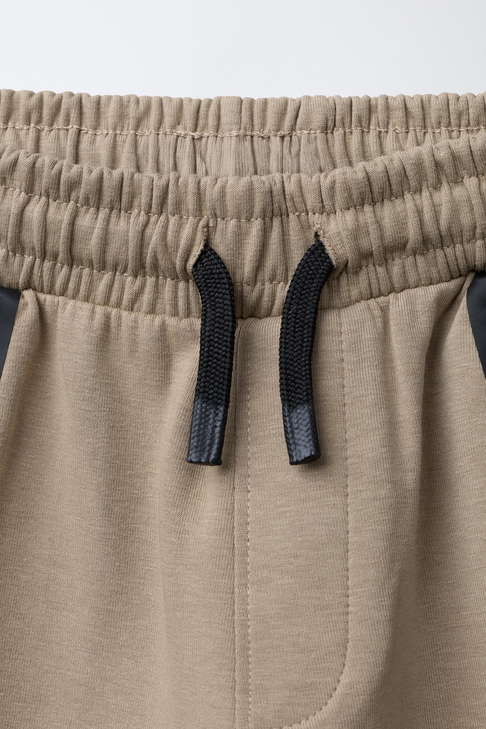 SPORTY INTERLOCK JOGGERS