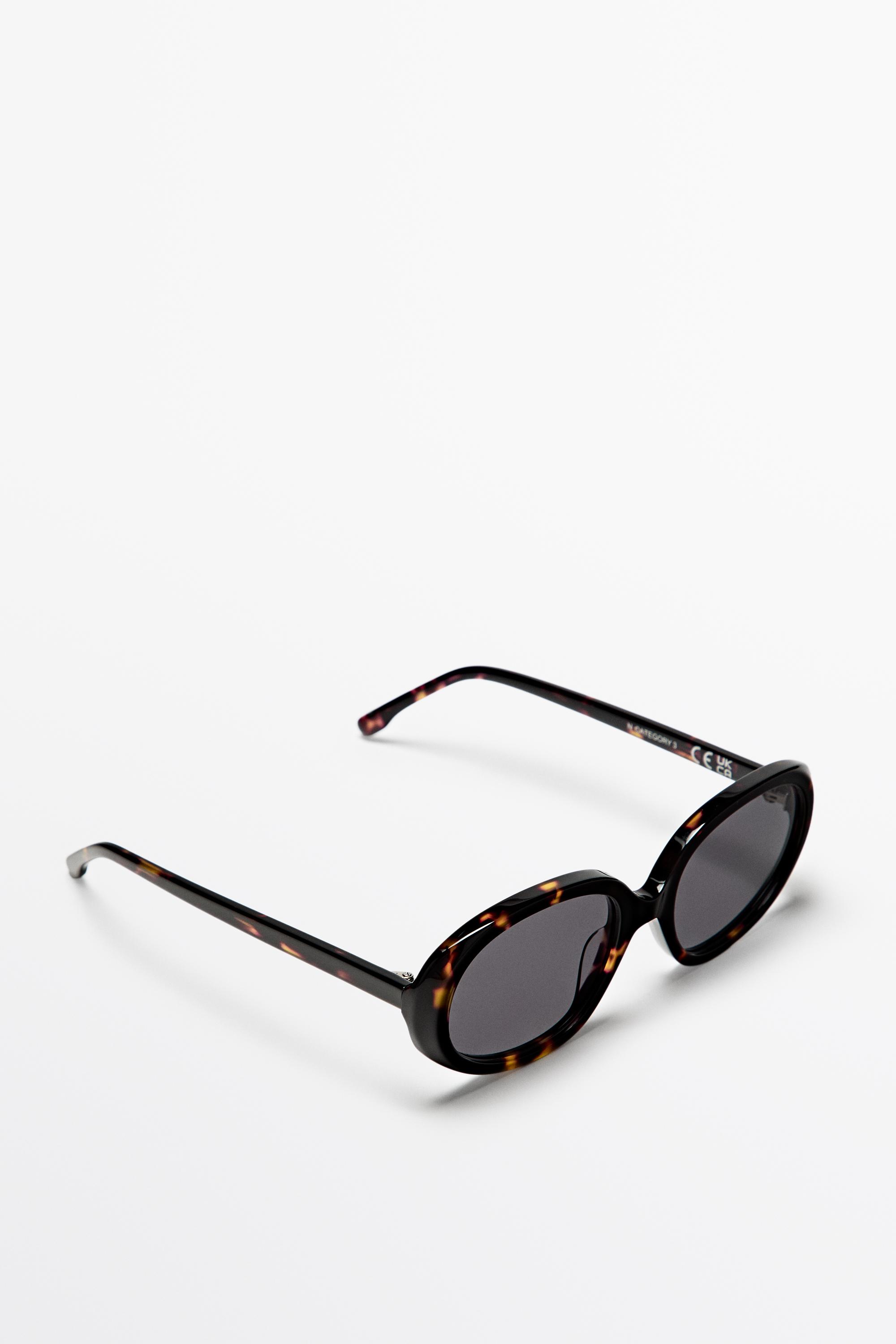 Oval tortoiseshell-effect sunglasses