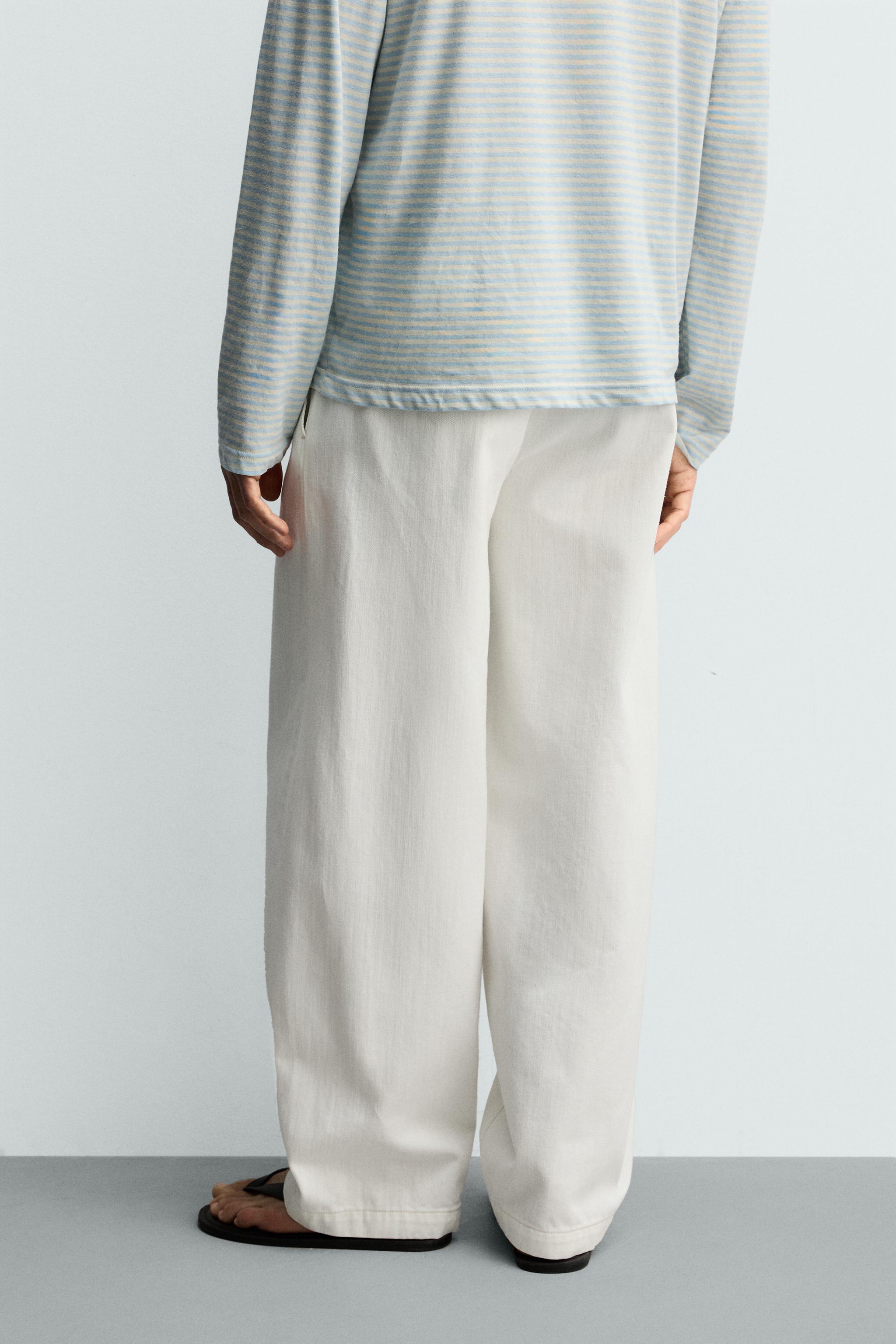 PLEATED BARREL FIT DENIM CHINO PANTS