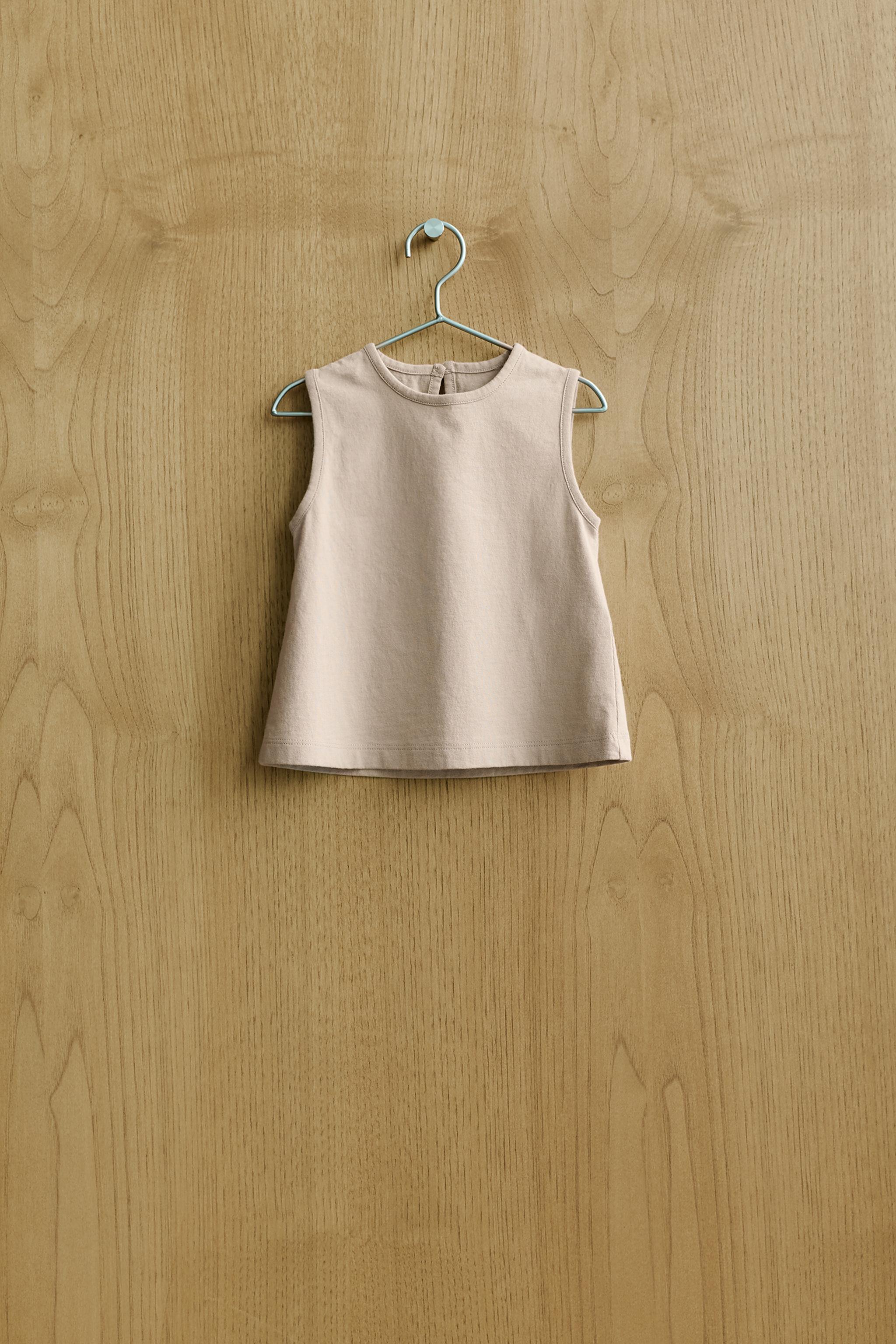 BUTTONED SLEEVELESS TOP — Beige