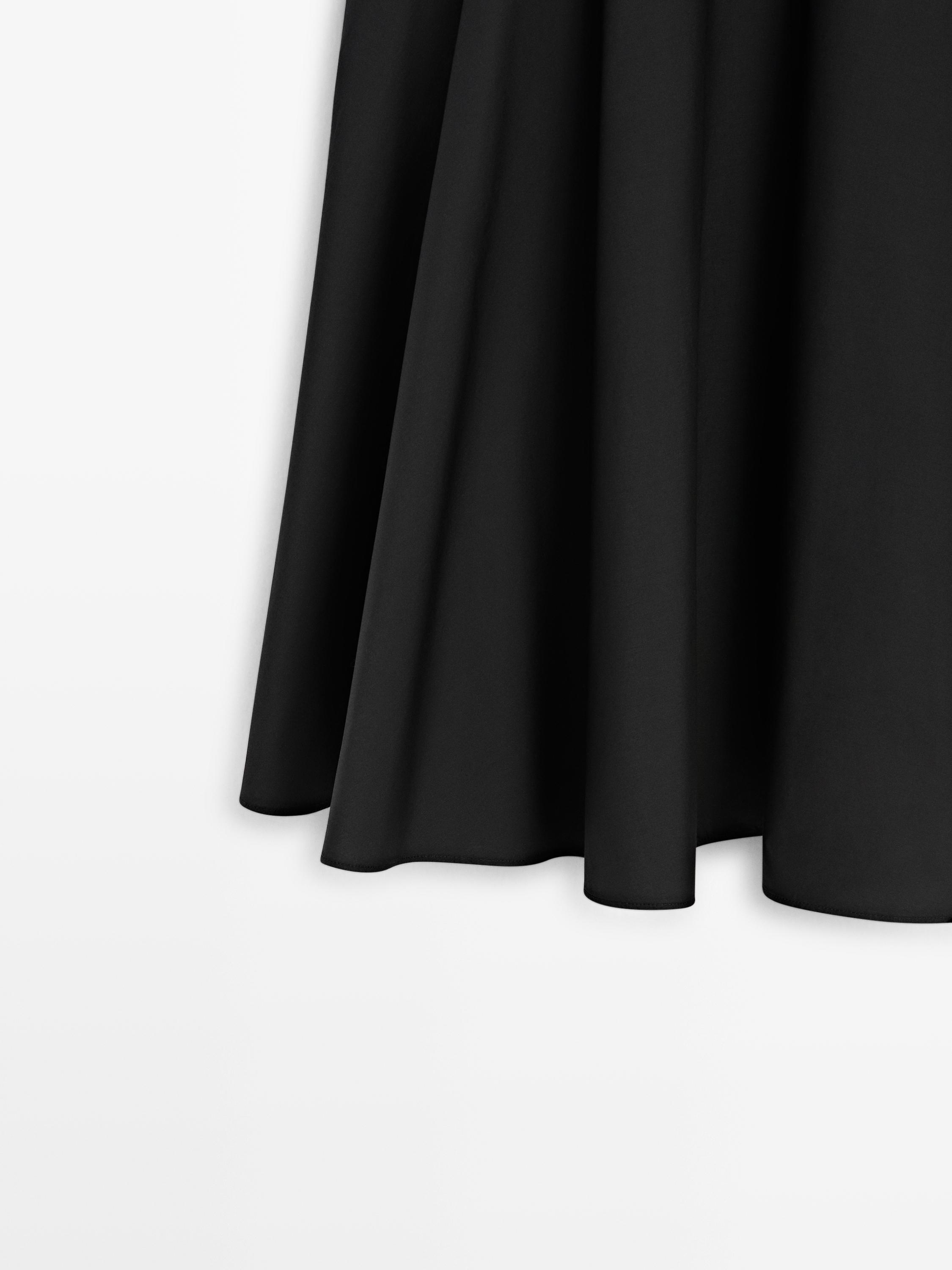 Jupe midi à détail foulard