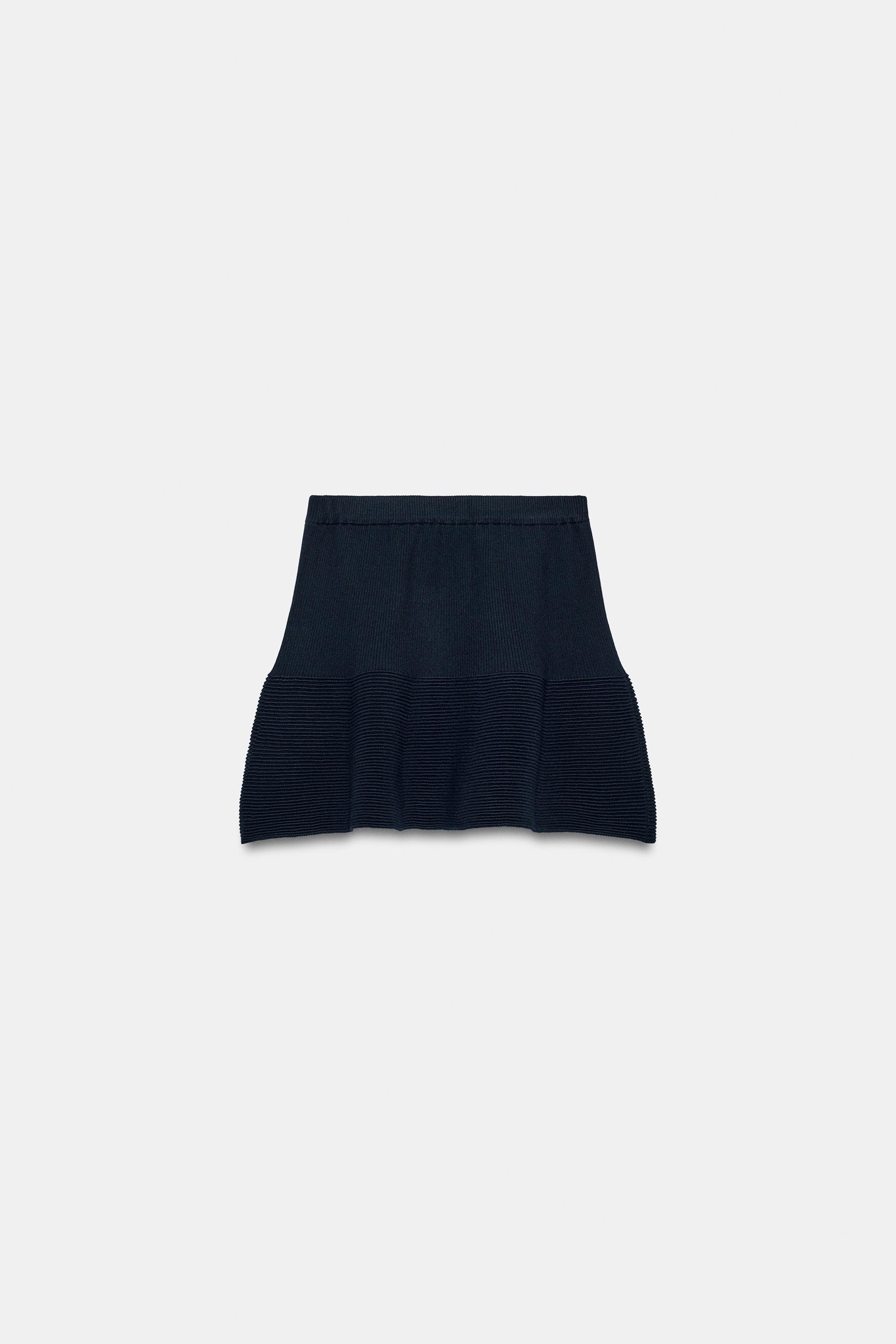 PEPLUM KNIT MINI SKIRT