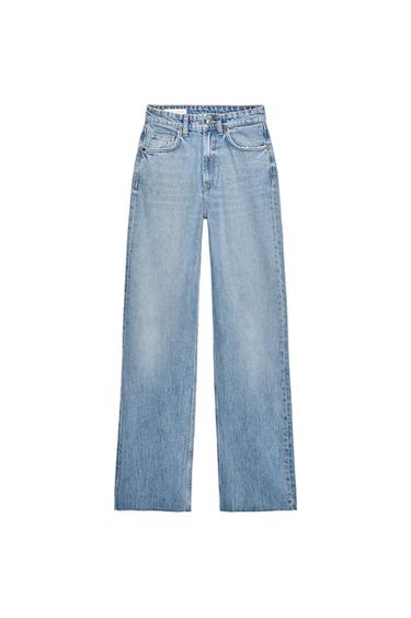 Front view of blue jeans with front pockets and belt loops.