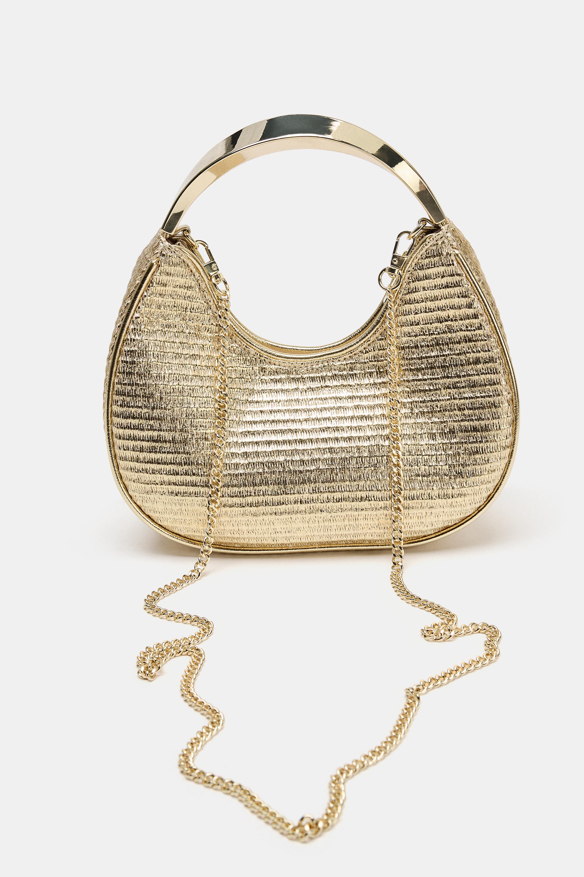 SAC AVEC ANSE MÉTALLIQUE