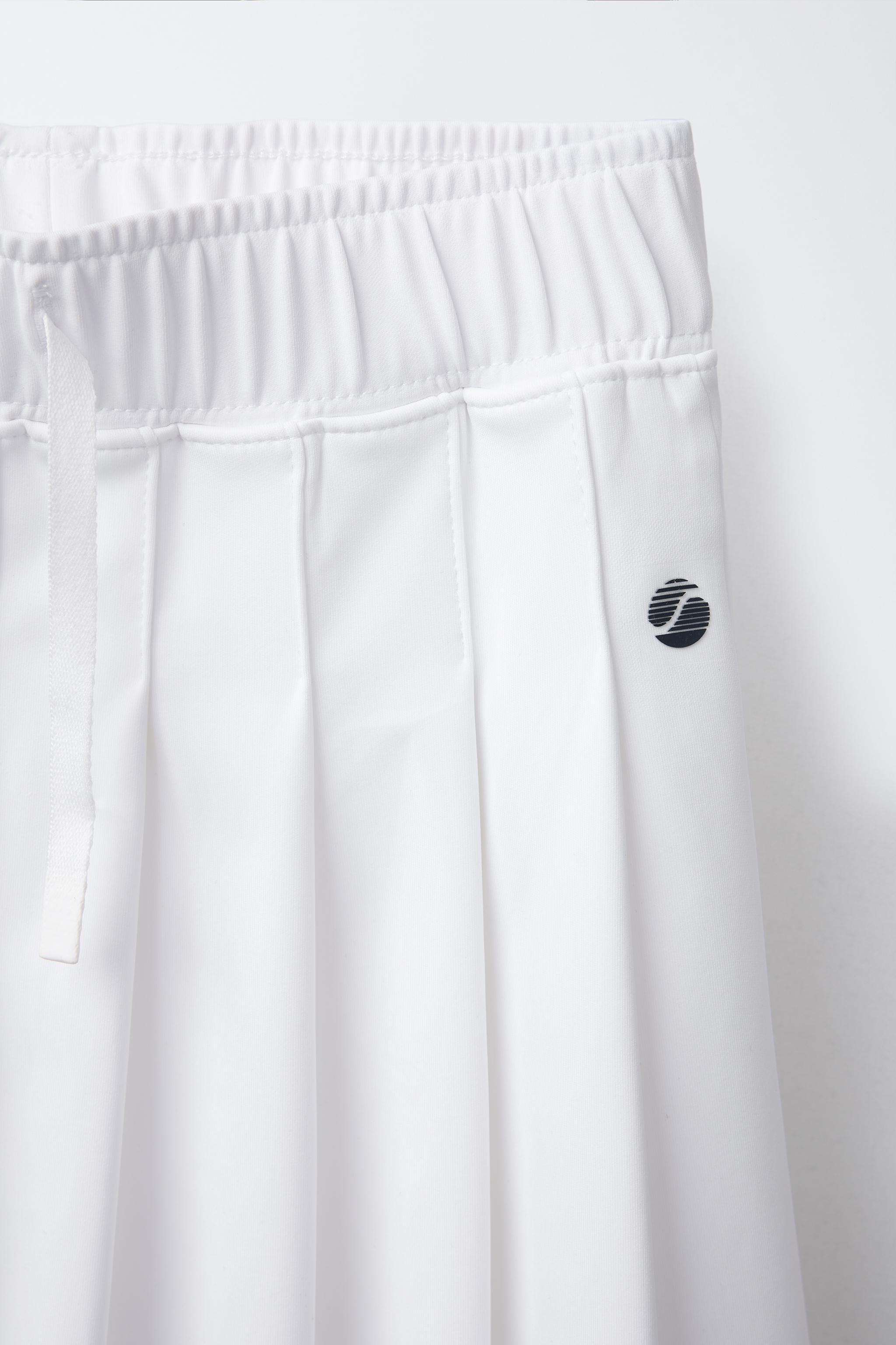 JUPE-SHORT À PLIS PLATS
