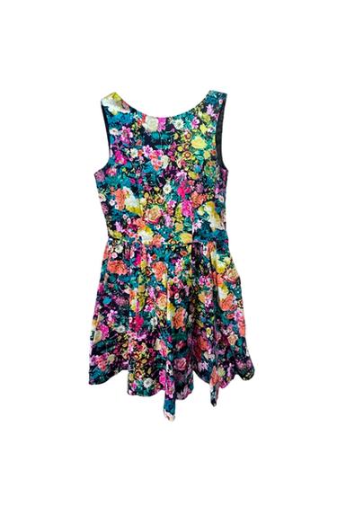 MINI FLORAL FIT AND FLARE DRESS IN BLACK WITH YELLOW, PINK AND TEAL FLOWERS.