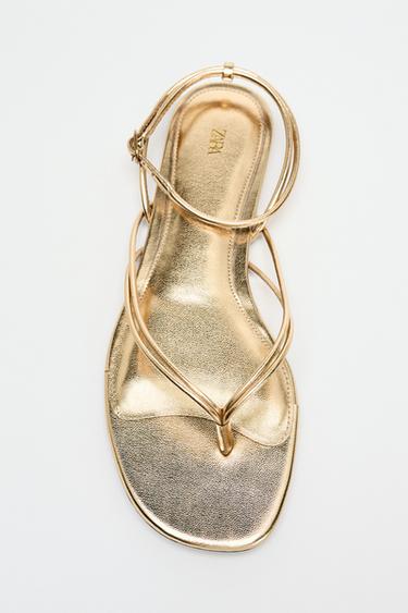 SANDALIA PLANA EFECTO METALIZADO - Oro de Zara