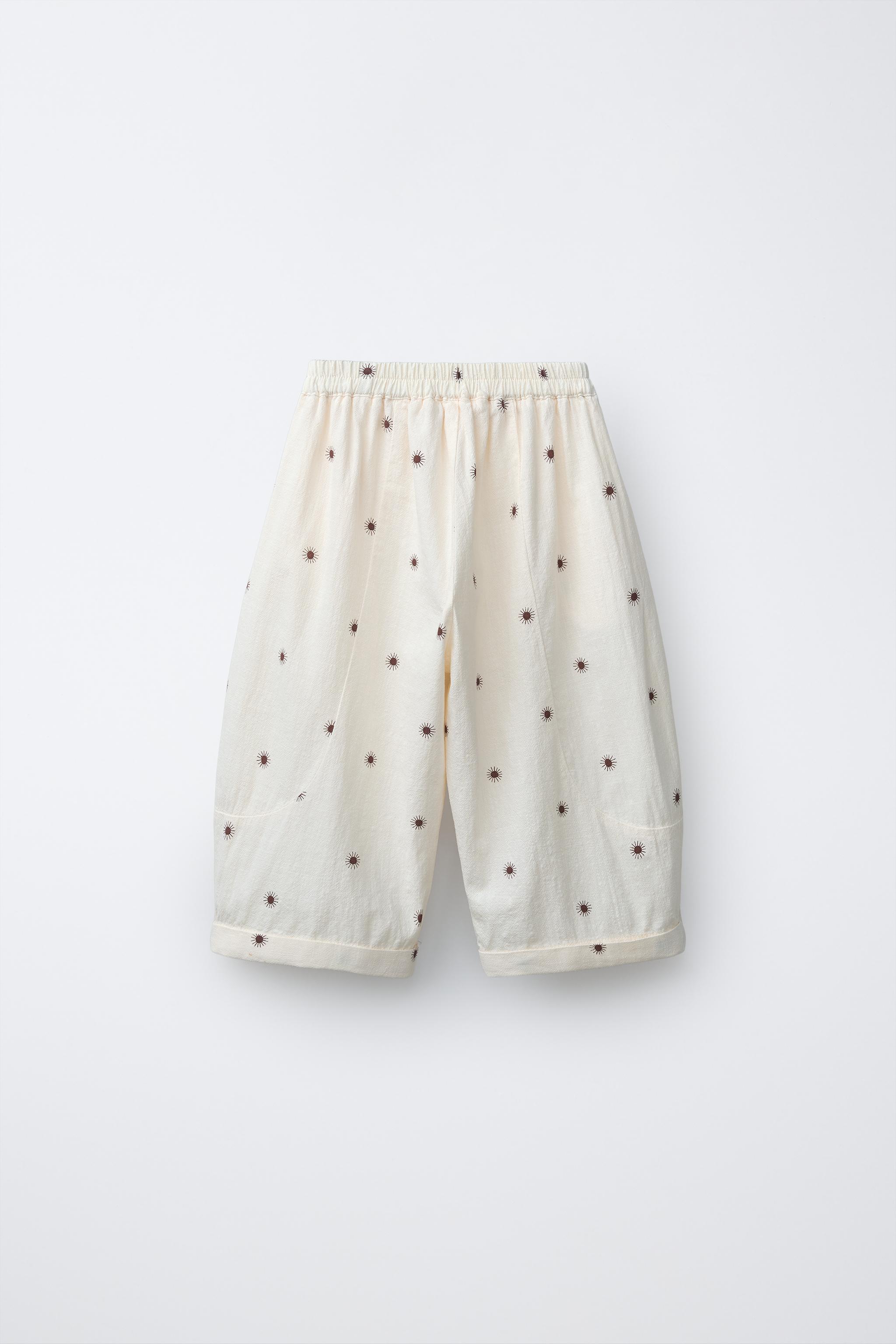 TEXTURED SUN PRINT BAGGY PANTS