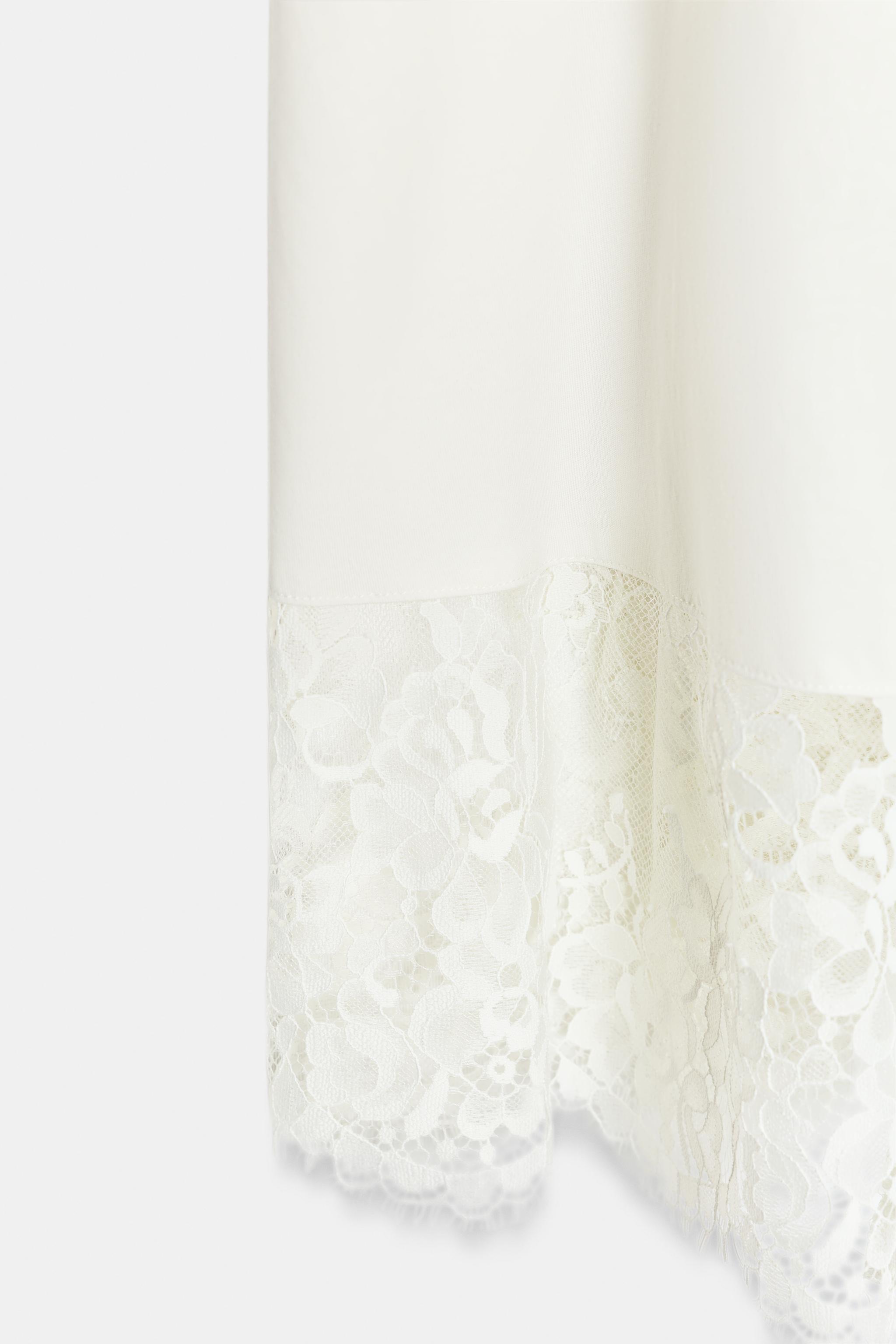 VOLUMINOUS LACE MIDI SKIRT