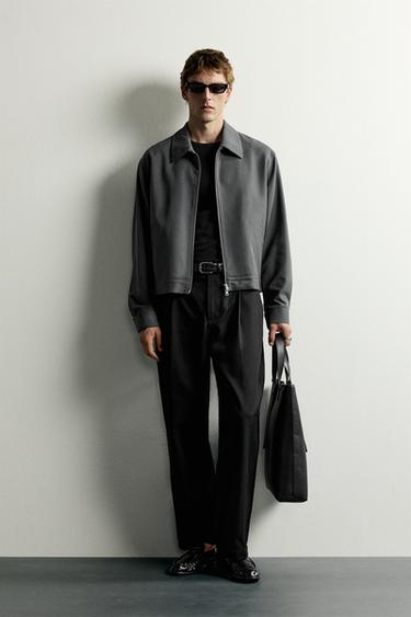PANTALÓN RELAXED FIT PLIEGUES - Negro de Zara - Imagen 0