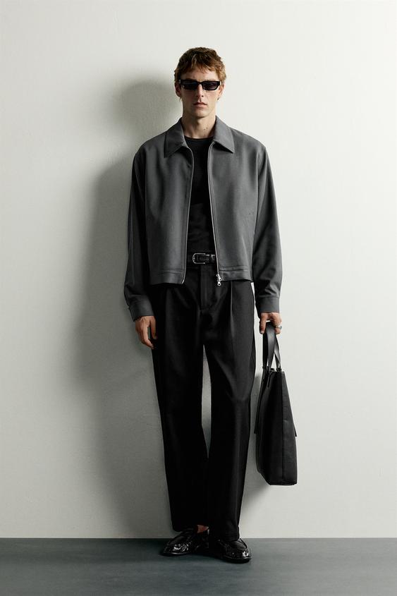 PANTALÓN RELAXED FIT PLIEGUES - Negro de Zara - Imagen 0
