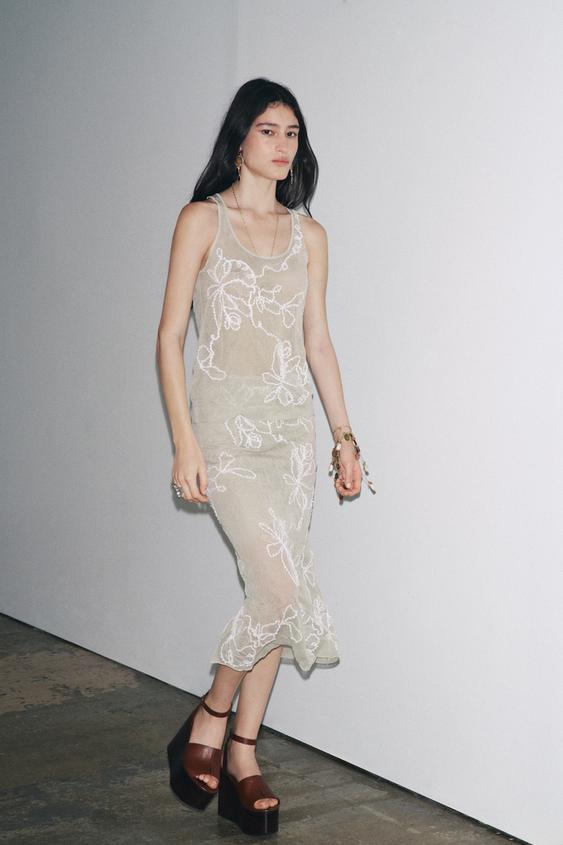 SEMI-SHEER STRUCTURED KNIT SKIRT