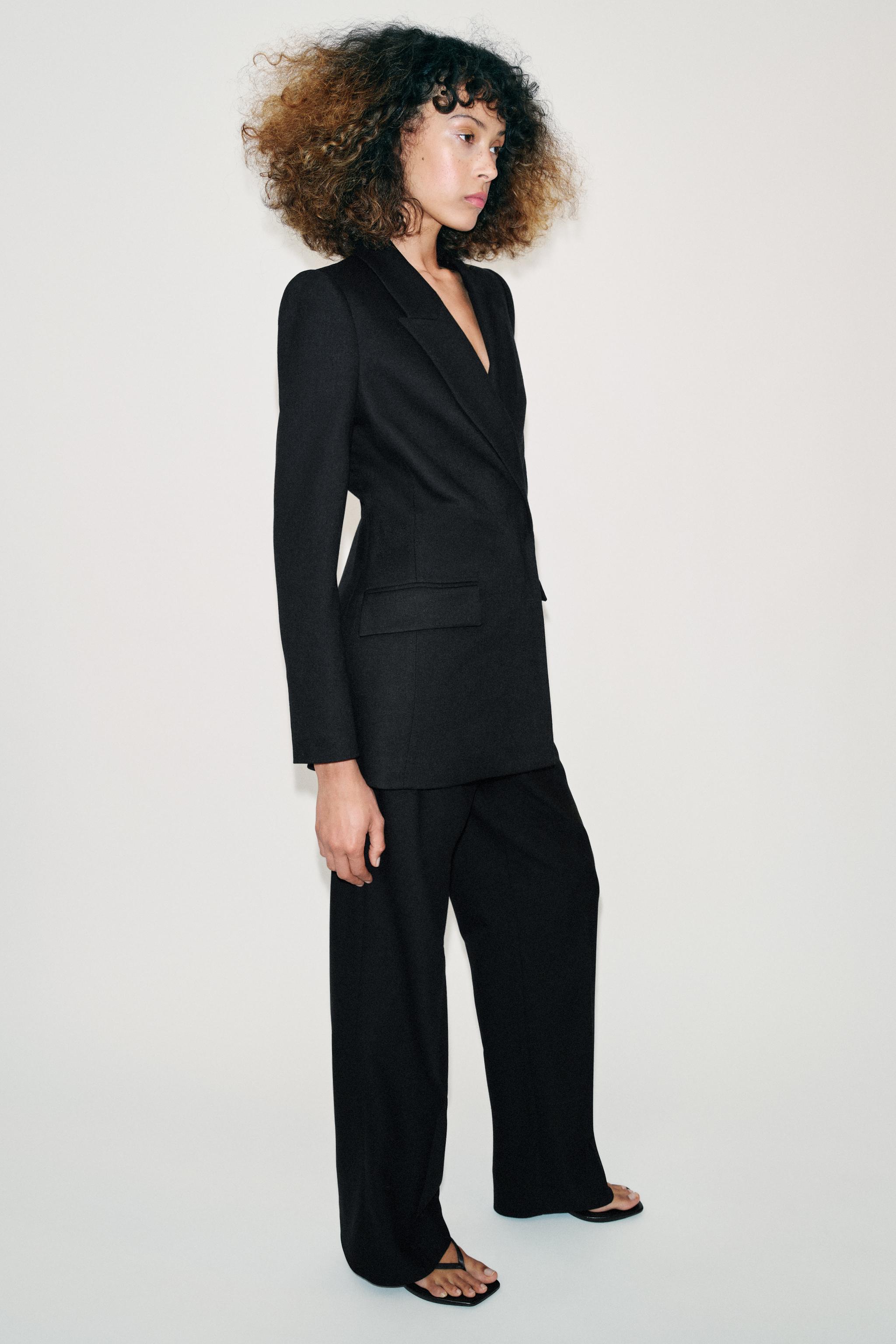 VESTE CROISÉE À TAILLE BALLON ET ÉPAULETTES
