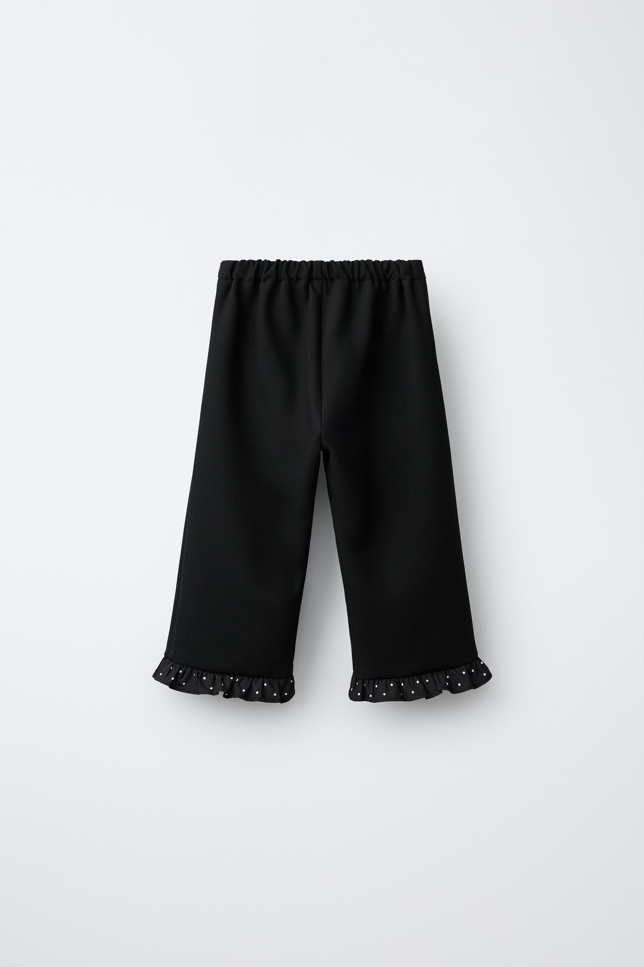 CULOTTE PANTS WITH RUFFLED HEM — Black