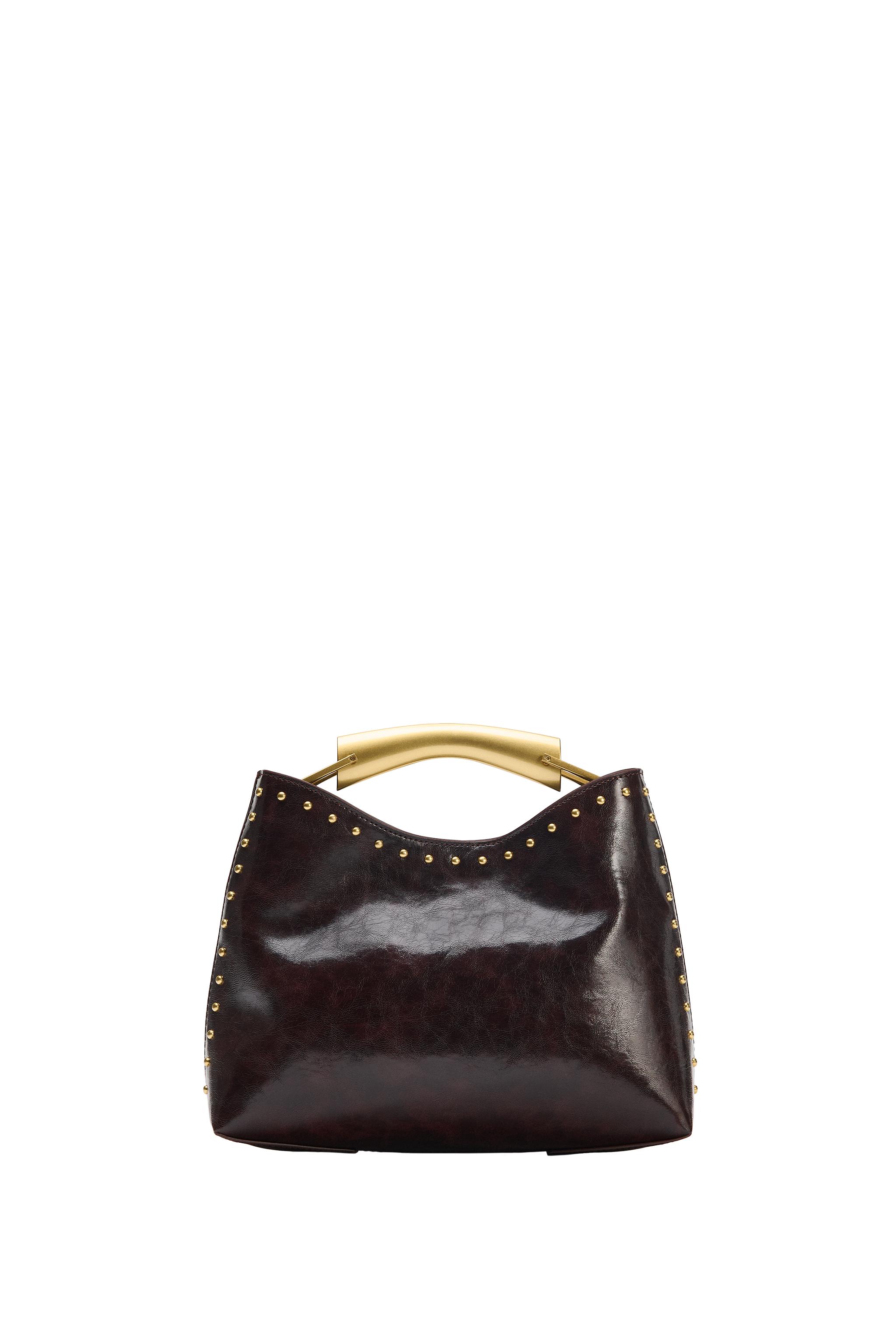 BOLSO DE MANO TACHAS