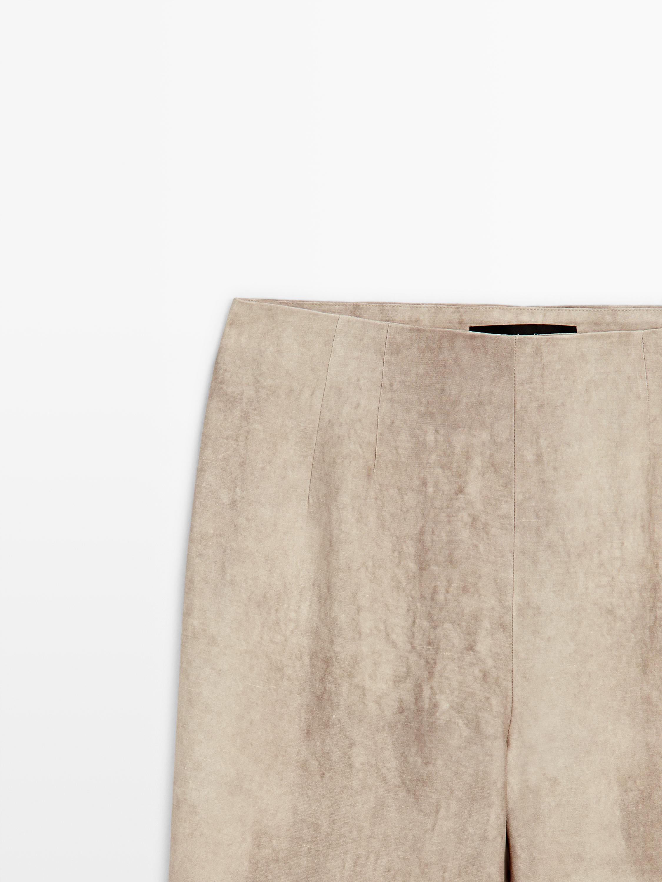 Distressed-effect flowing trousers