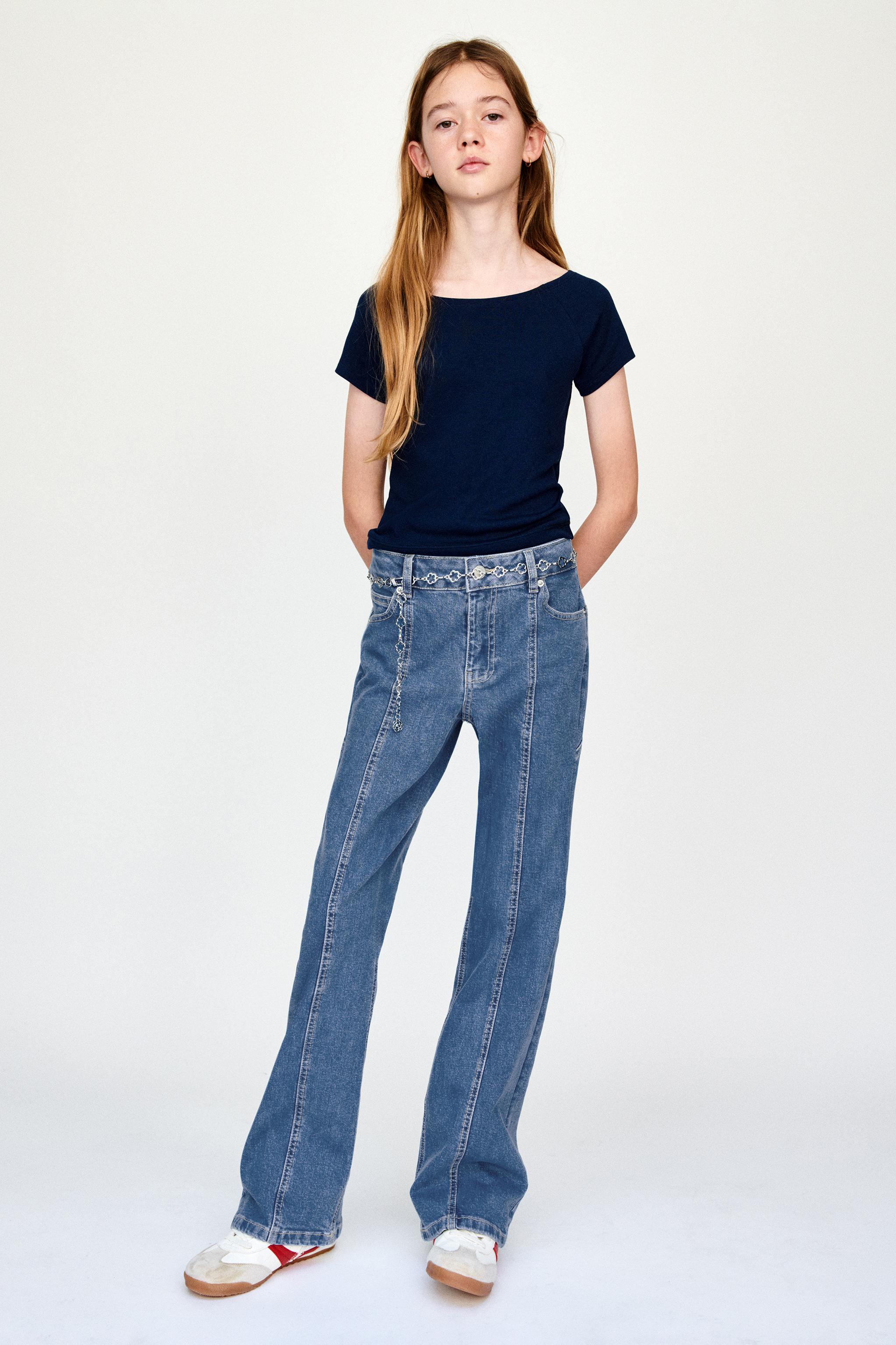 BOOTCUT JEANS WITH STAR PATCHES