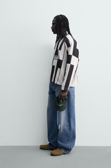 T-SHIRT EN JACQUARD À RAYURES STRUCTURÉ - Blanc / Noir de Zara - Image 3