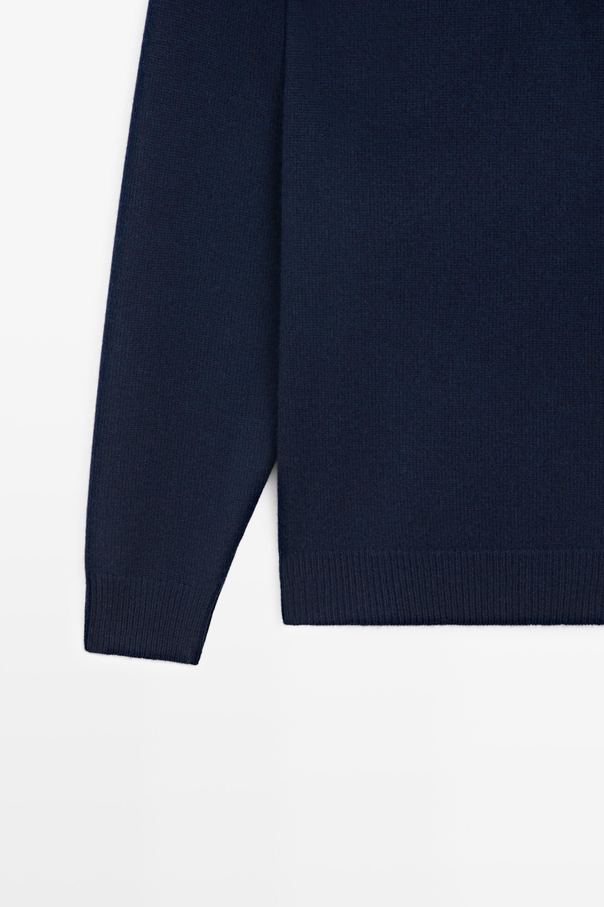 Pull polo en maille détail poche