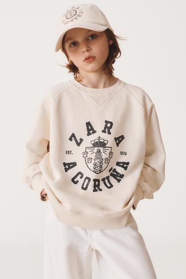 6-14 AÑOS/ SUDADERA VARSITY 50TH ANNIVERSARY - Crudo de Zara - Imagen 0