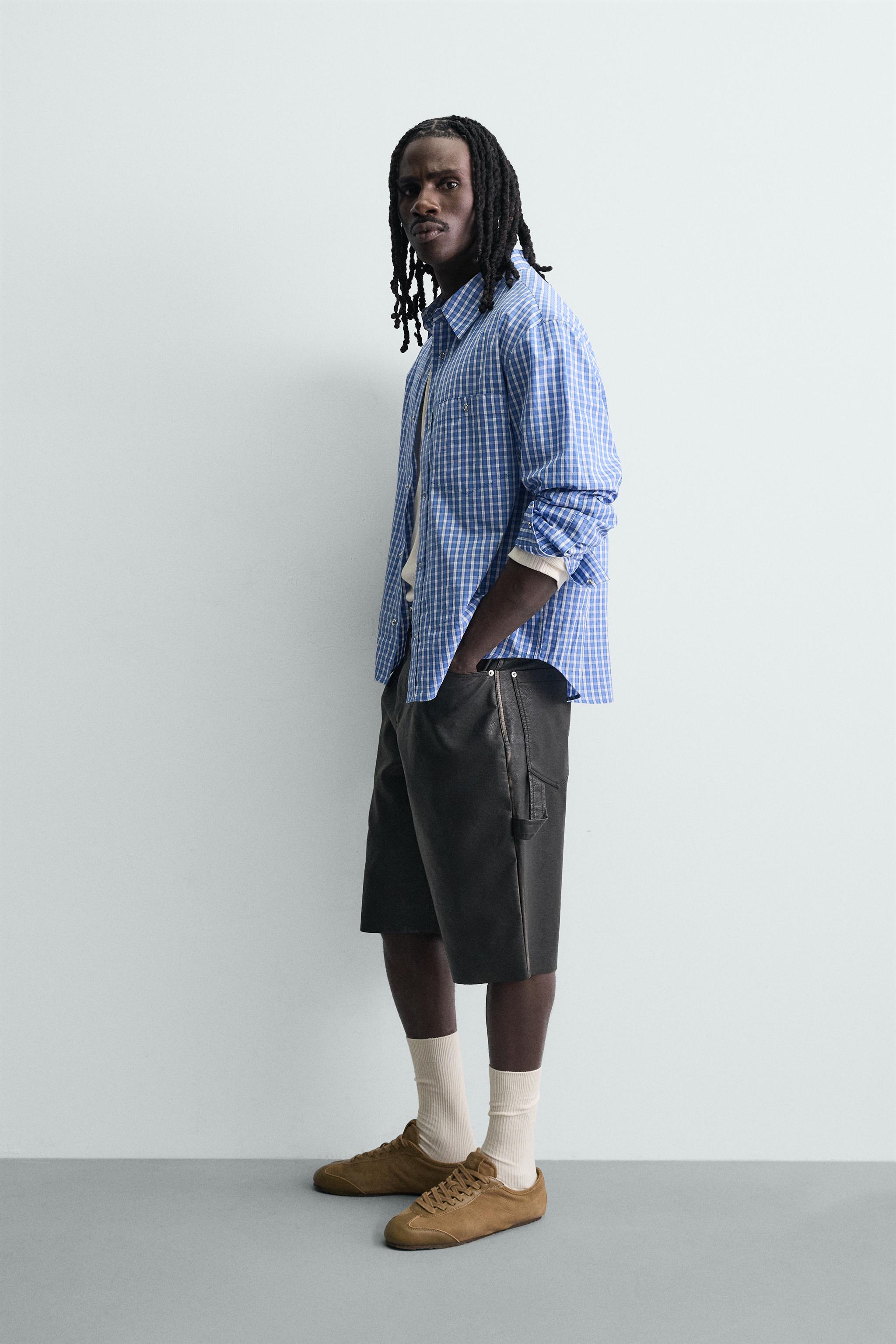 RELAXED FIT FAUX LEATHER SHORTS