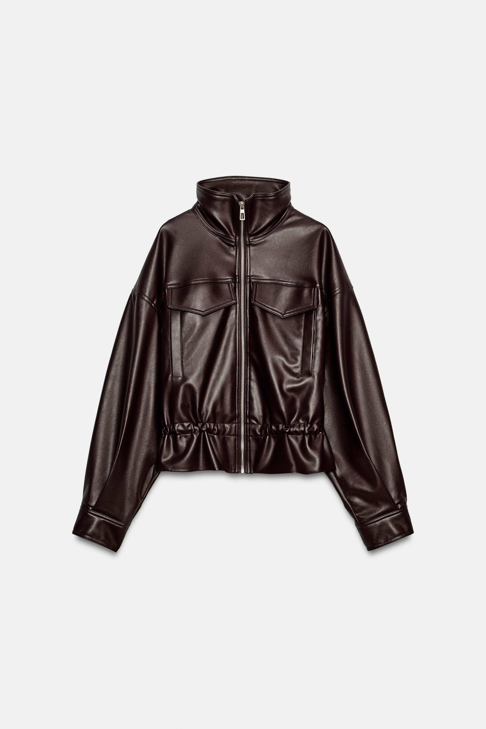 VESTE EN MATIÈRE SYNTHÉTIQUE À TAILLE AJUSTABLE