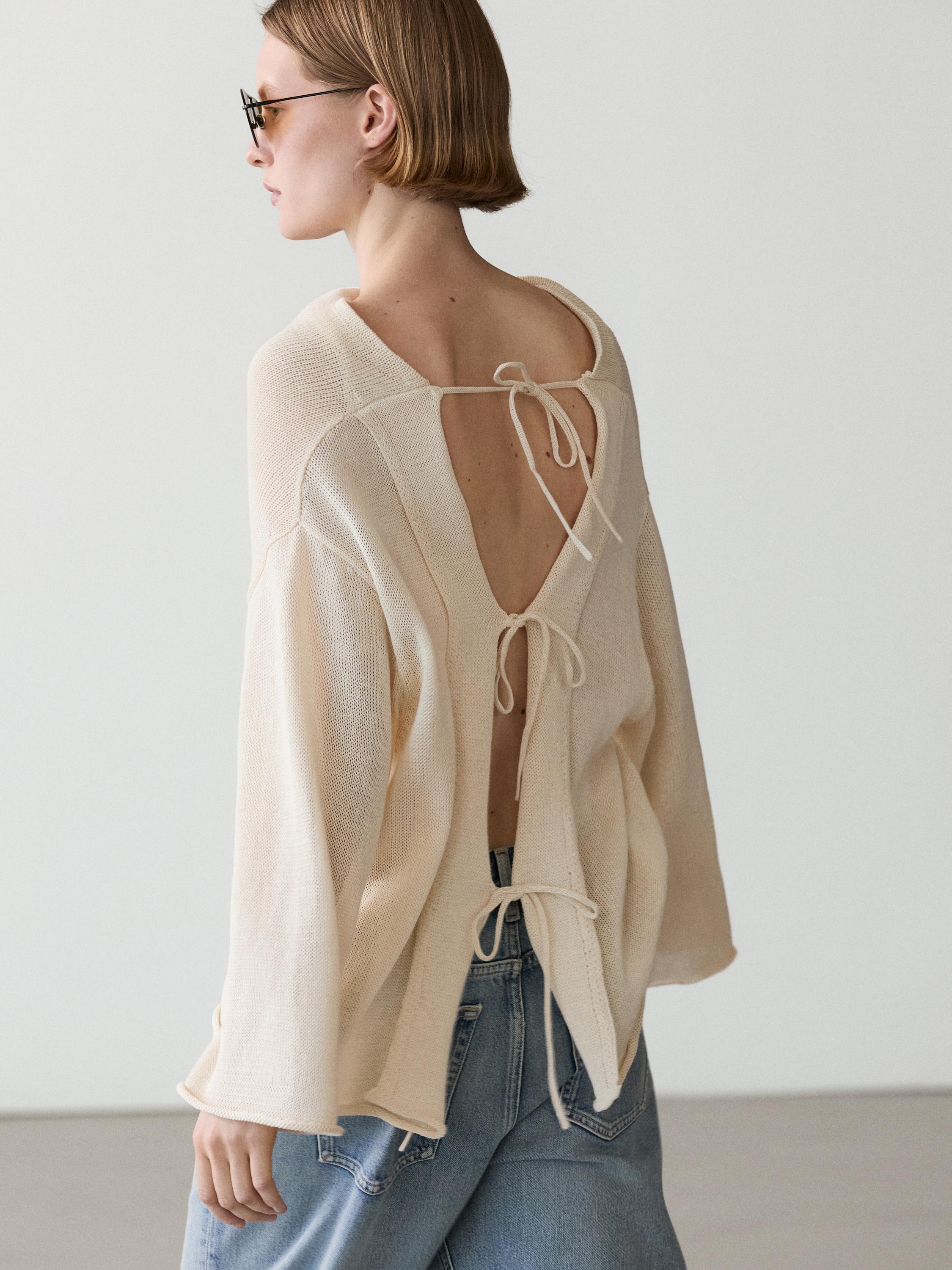 100% cotton knit sweater with back ties